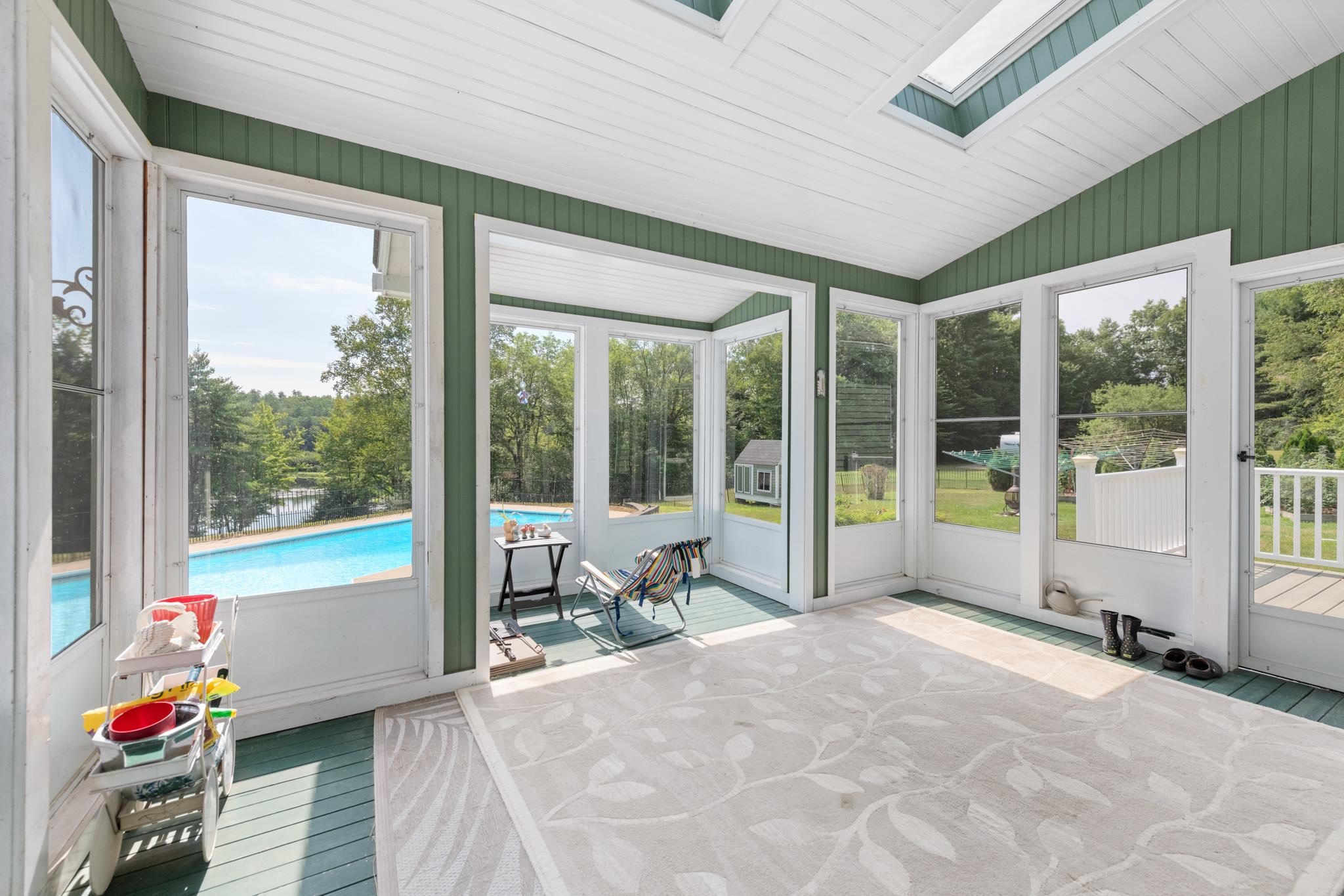 Sunroom overlooking pool and River