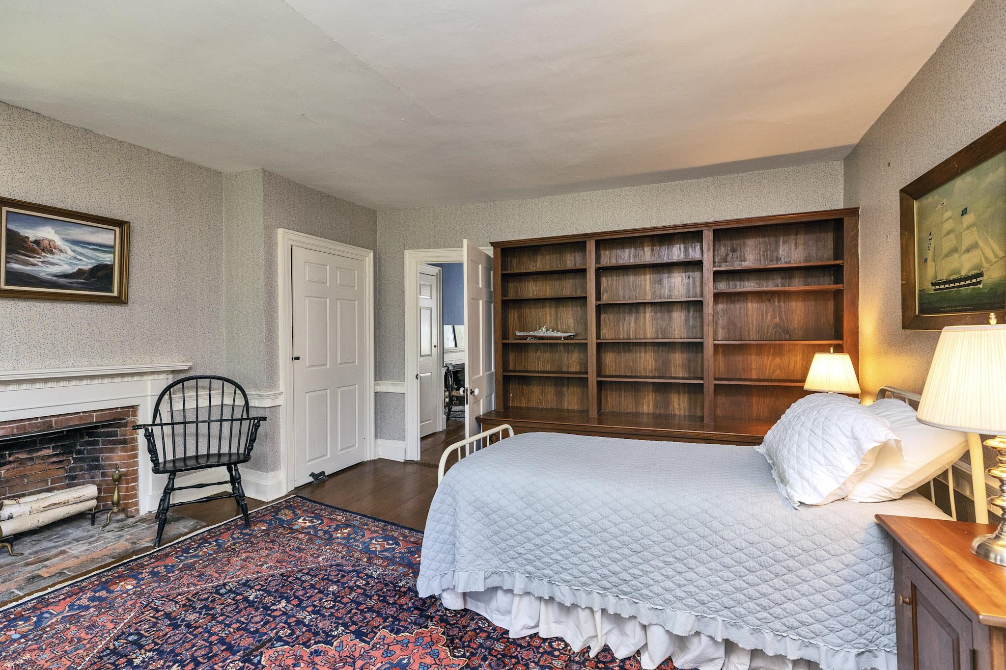 Front  corner bedroom with fireplace