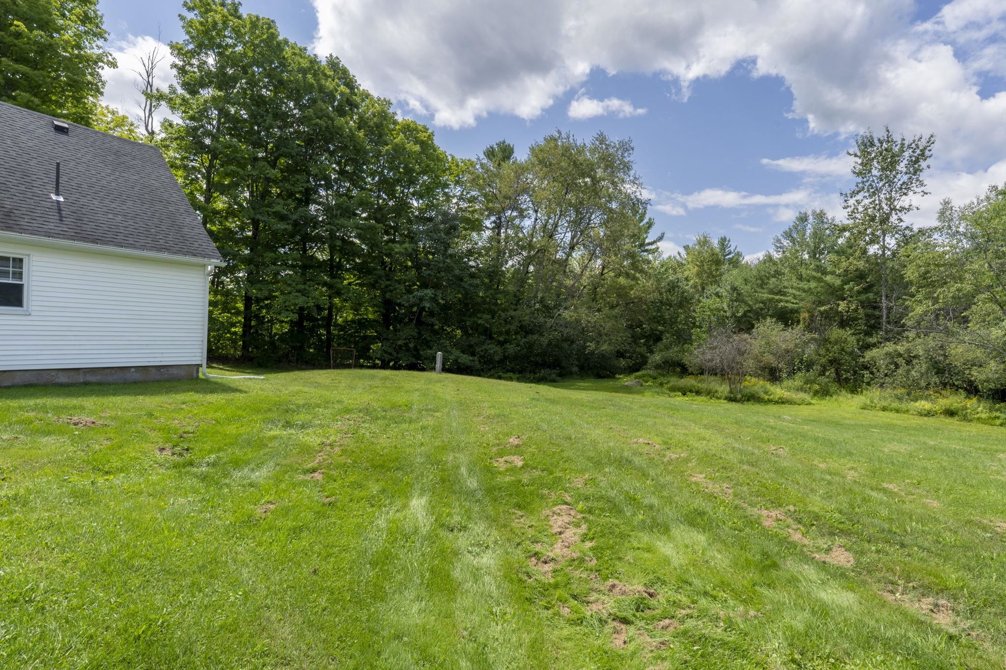 4 acres of green grass in back 26017552