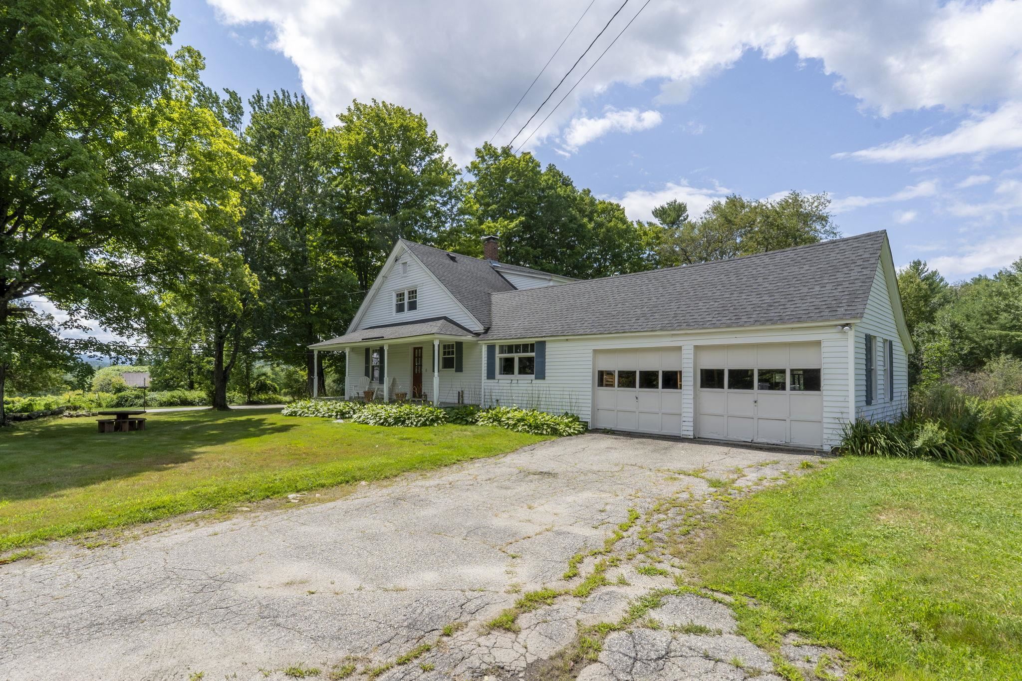 Driveway view of house 26017555
