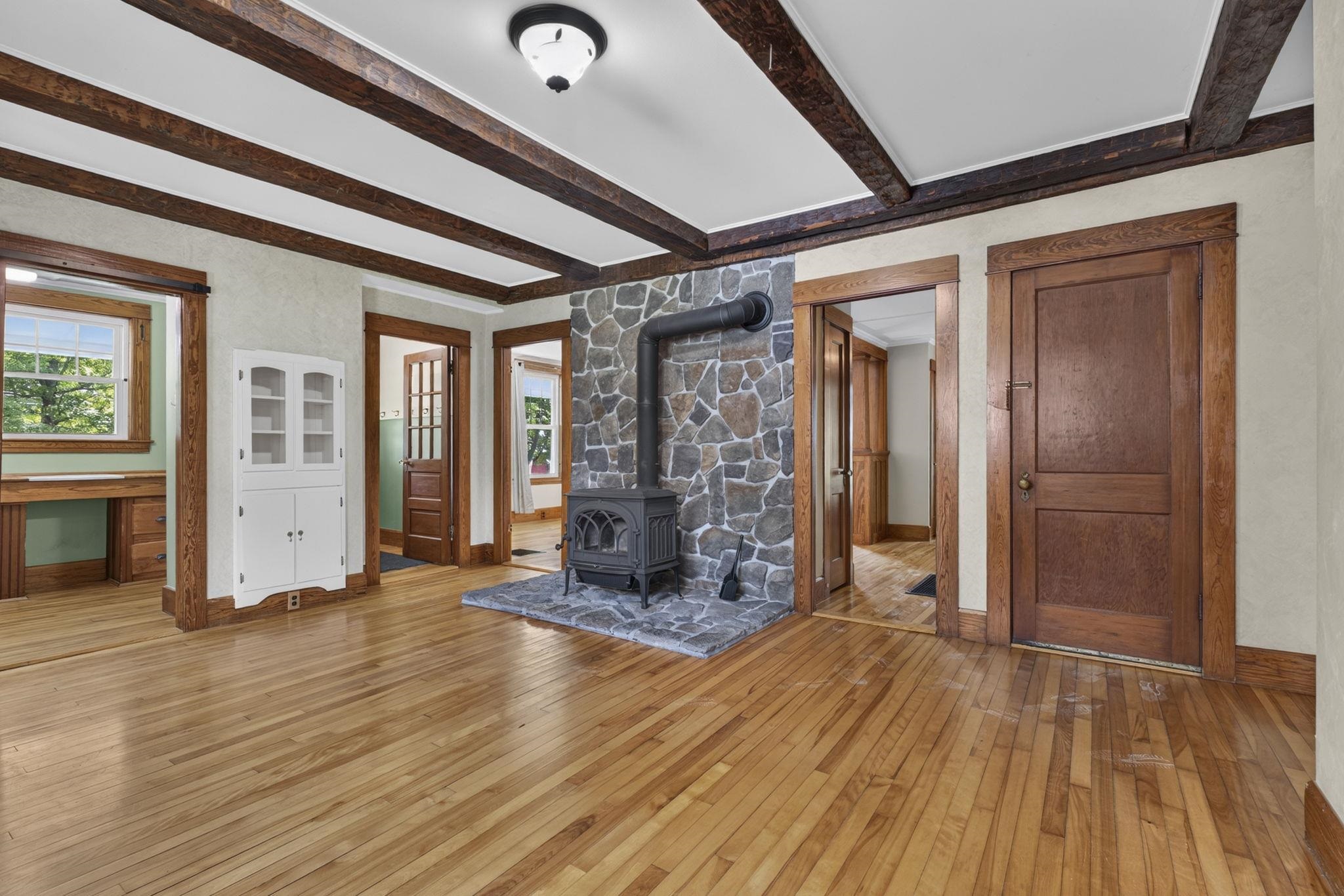 Stone hearth with decortive wood burning stove 26017596