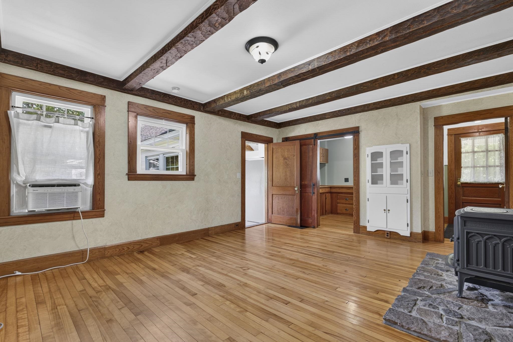 Living room with stone hearth 26017598