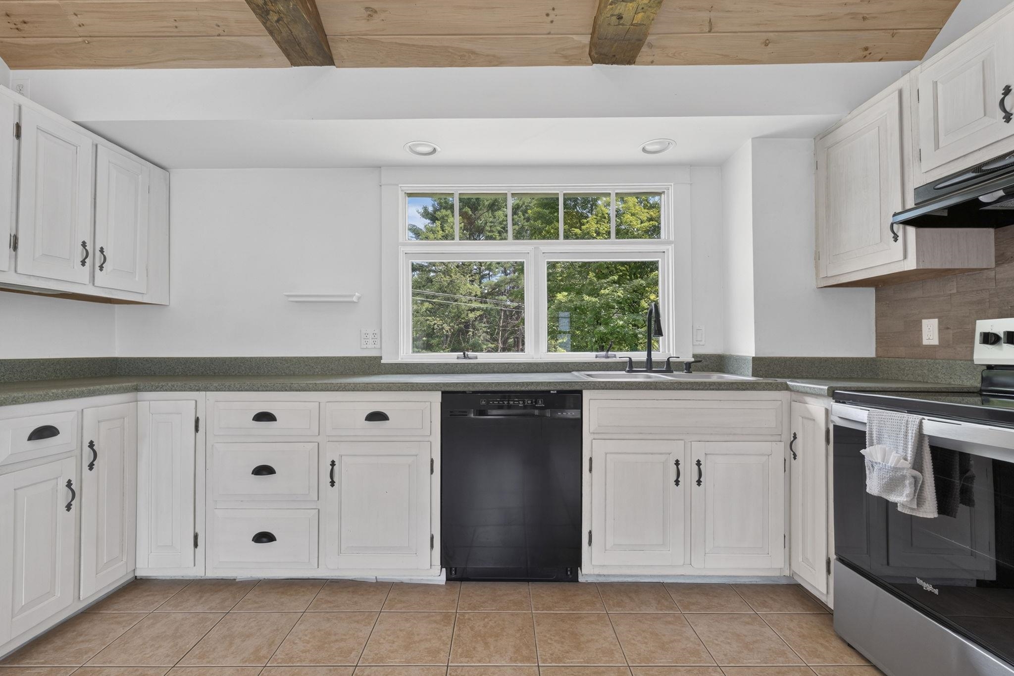 Kitchen with window to front yard 26017605