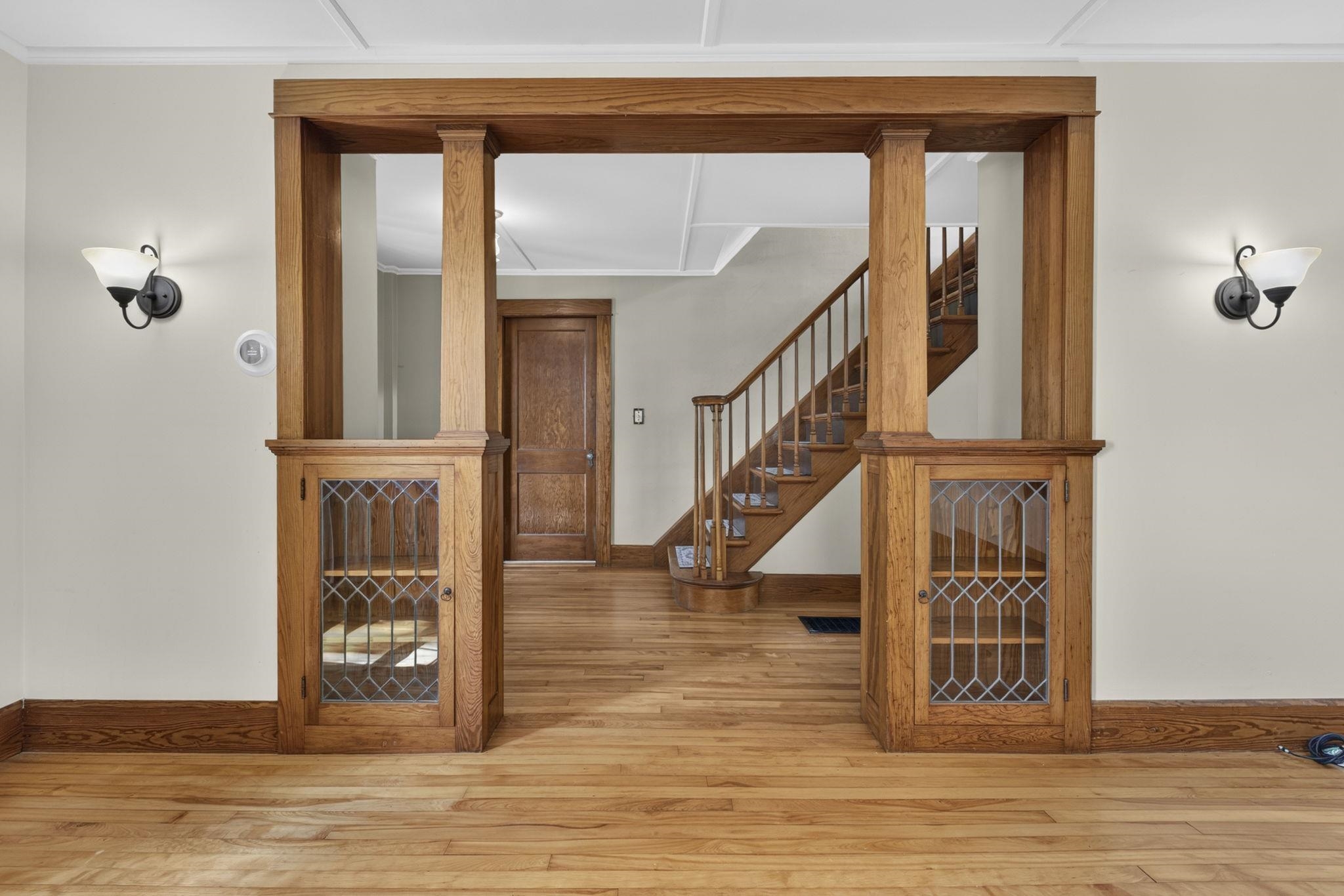 Front room with lead paned glass bookcases 26017585