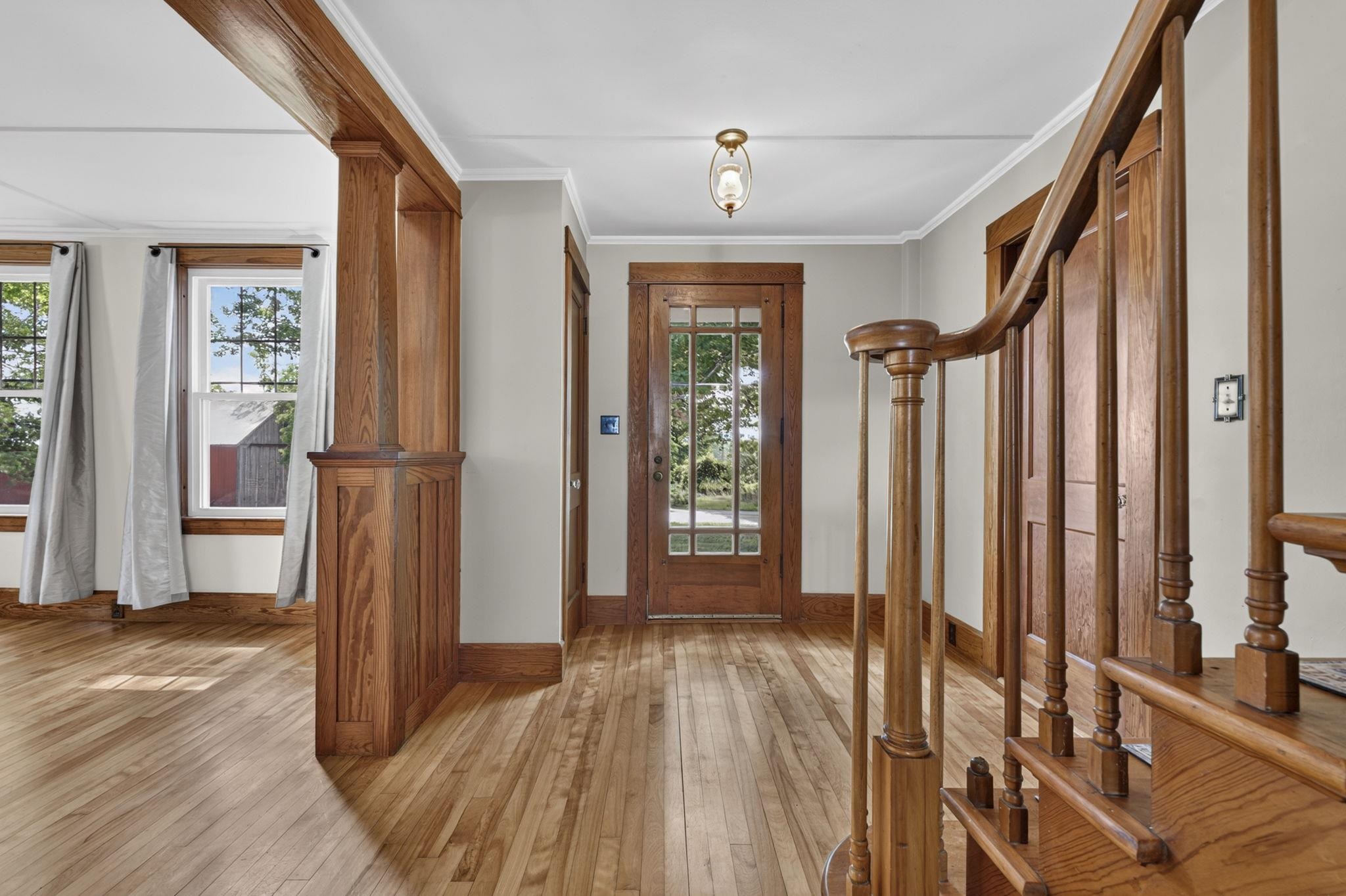 Hallway between front room and primary 1st floor 26017588