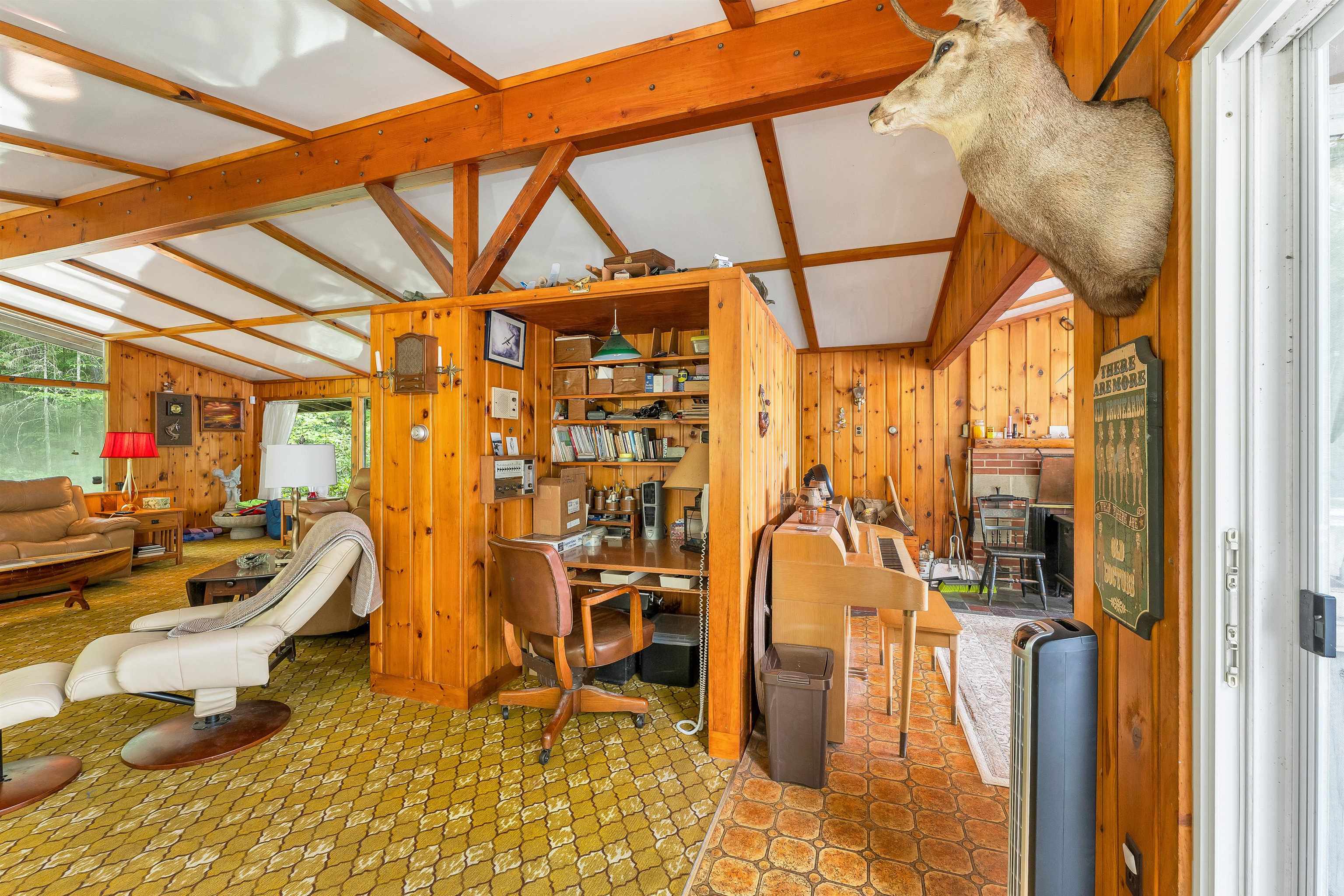 THERE ARE LARGE CLOSETS AND BUILT IN OFFICE AREA IN THE CENTER OF THE ROOM.