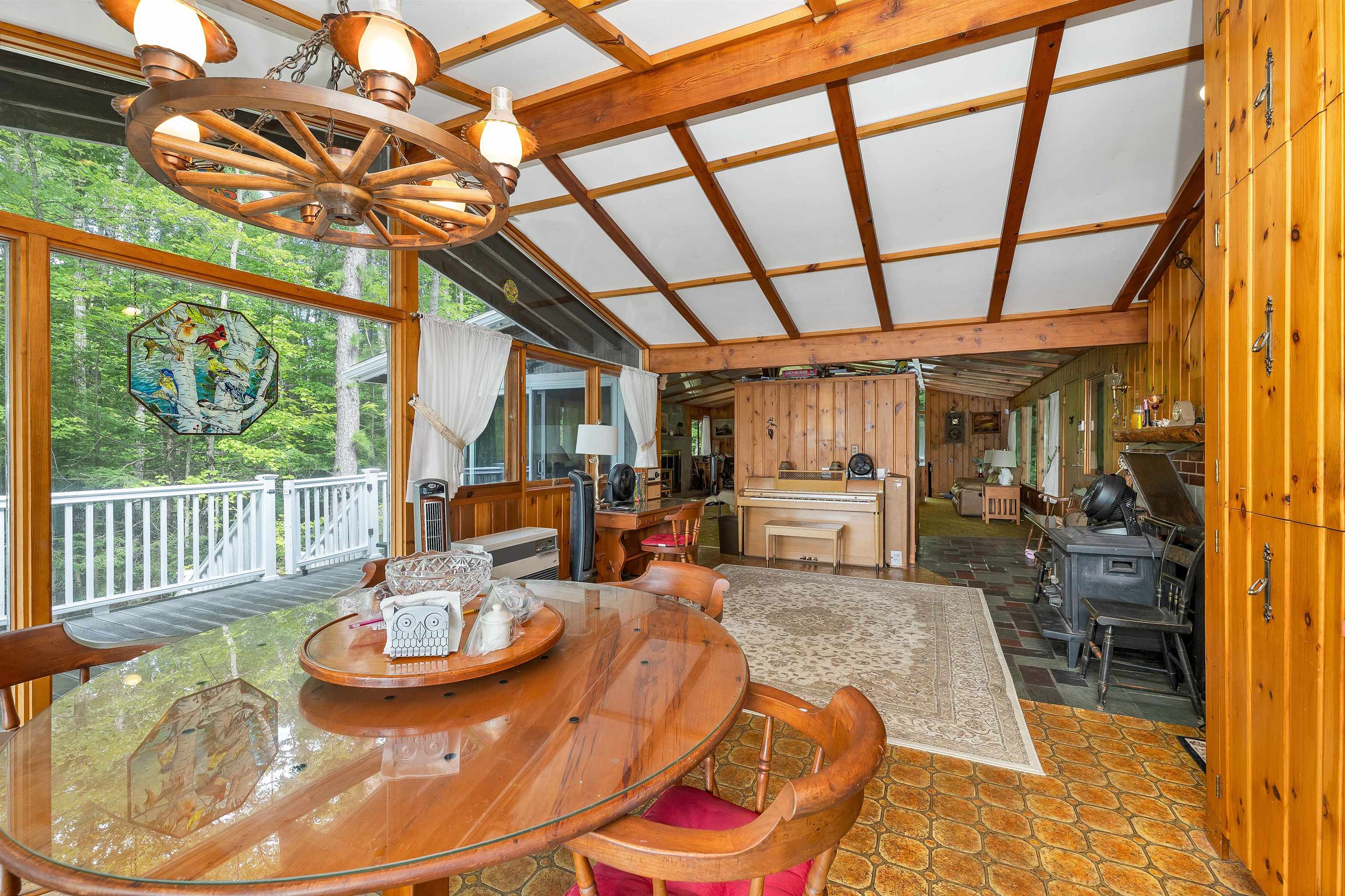THE SITTING ROOM OPENS TO THE DINING AREA.