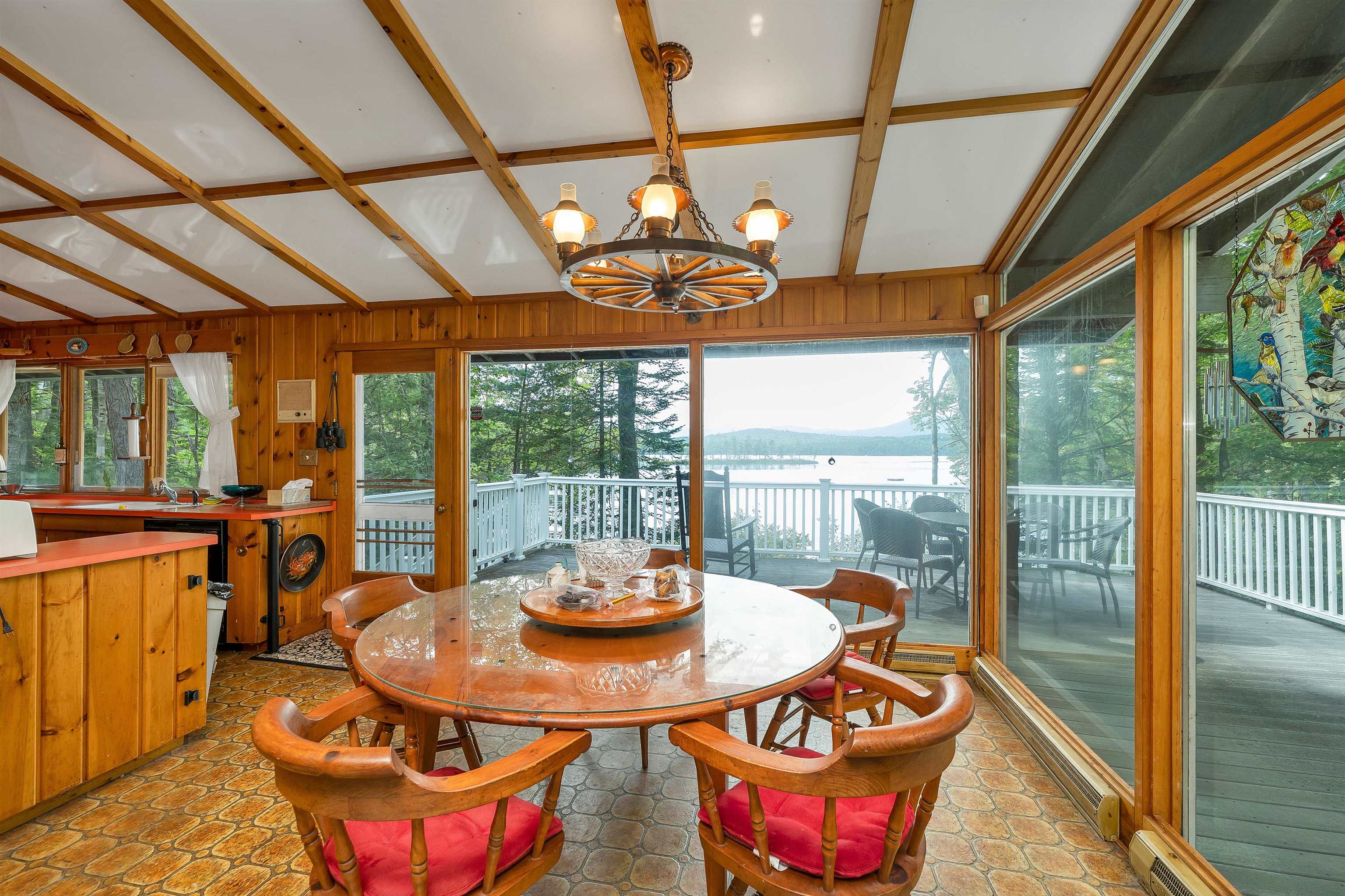 THE SETTING IS AMAZING.  THE WINDOWS BRING THE BEAUTY OF THE OUTSIDE TO THE INSIDE OF THE HOUSE!