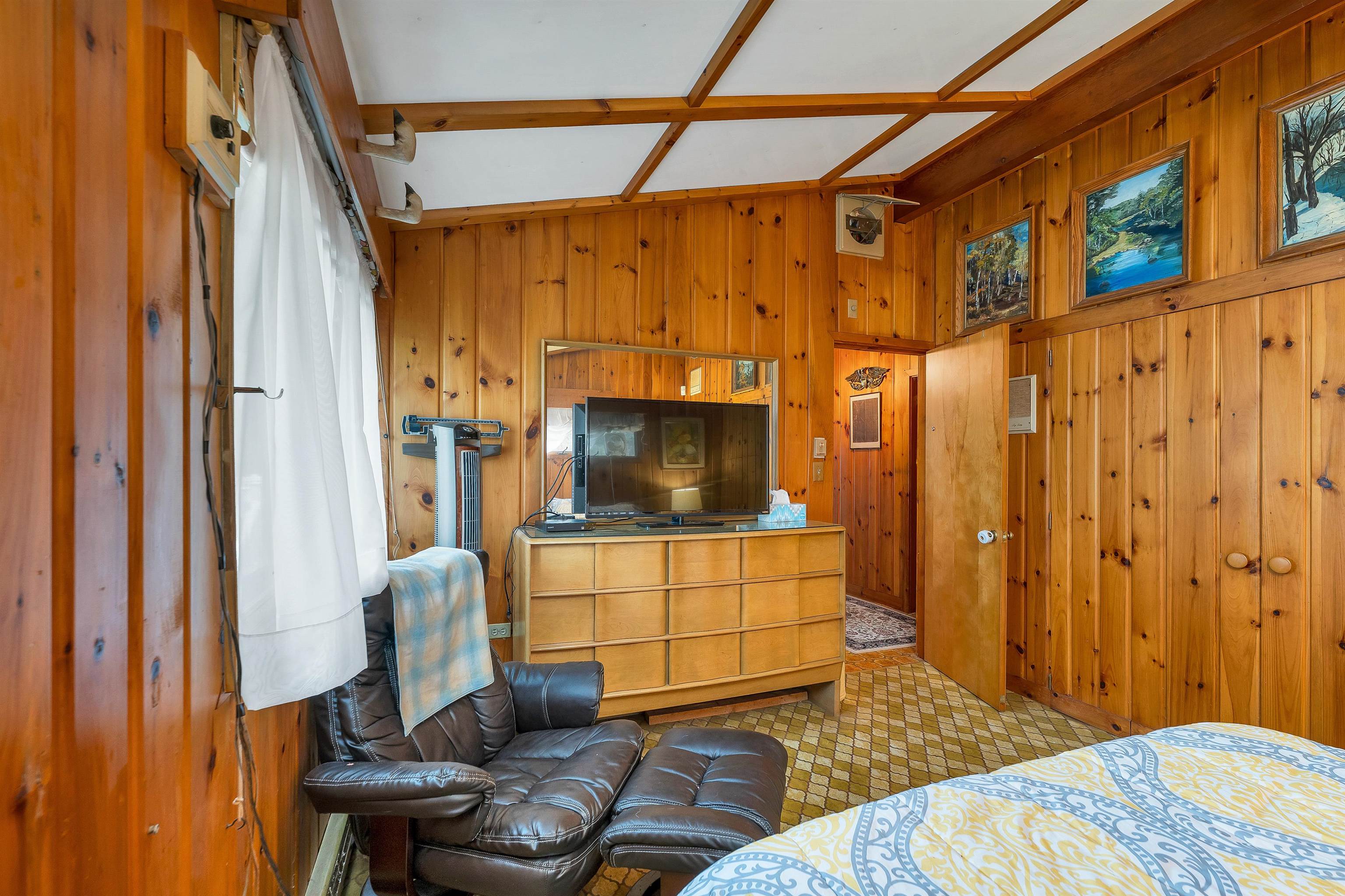 ALL OF THE WALLS ARE WOODED AND VERY INVITING!