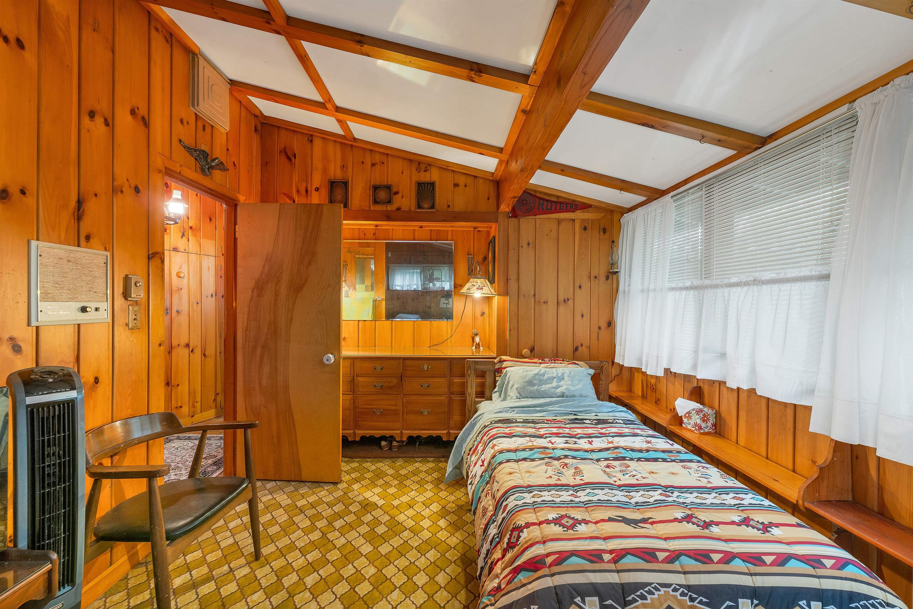 BUILT IN BUREAU AND SPACIOUS CLOSETS.