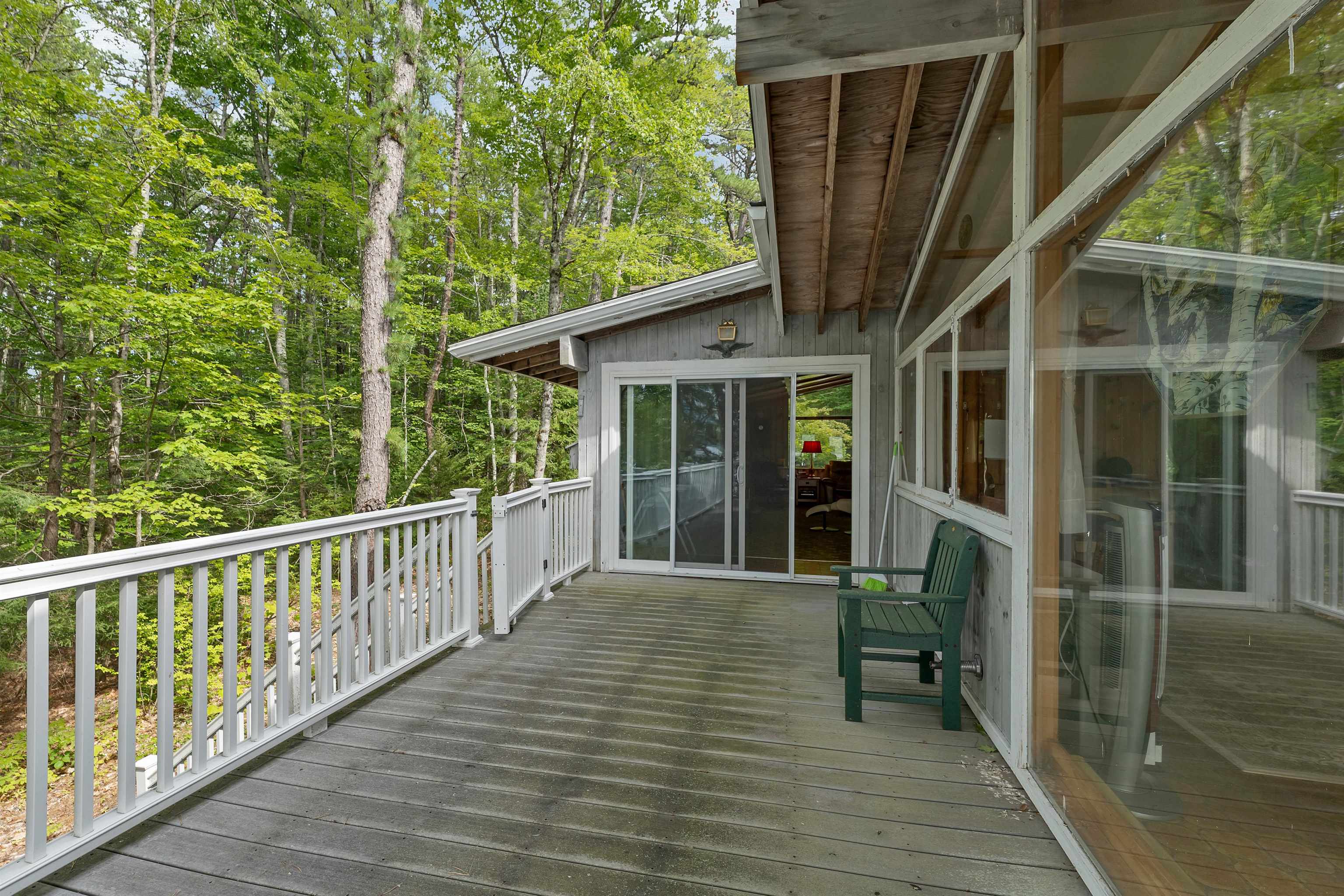 THE NORTHERLY SIDE OF THE DECK IS SHADED MUCH OF THE DAY FOR THOSE WHO CANNOT TAKE DIRECT SUN.