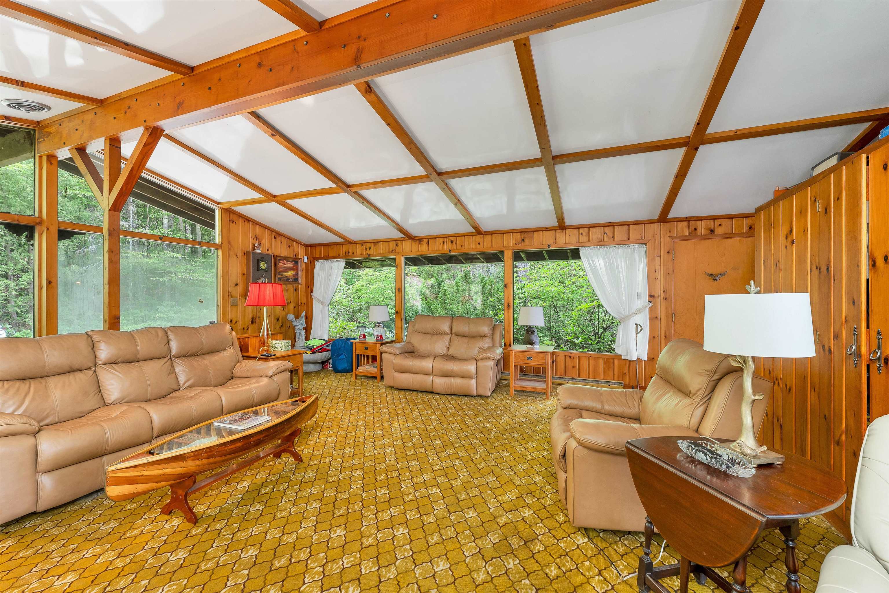 THE INTERIOR WALLS ARE QUALITY FINISHED TONGUE AND GROOVE PINE.