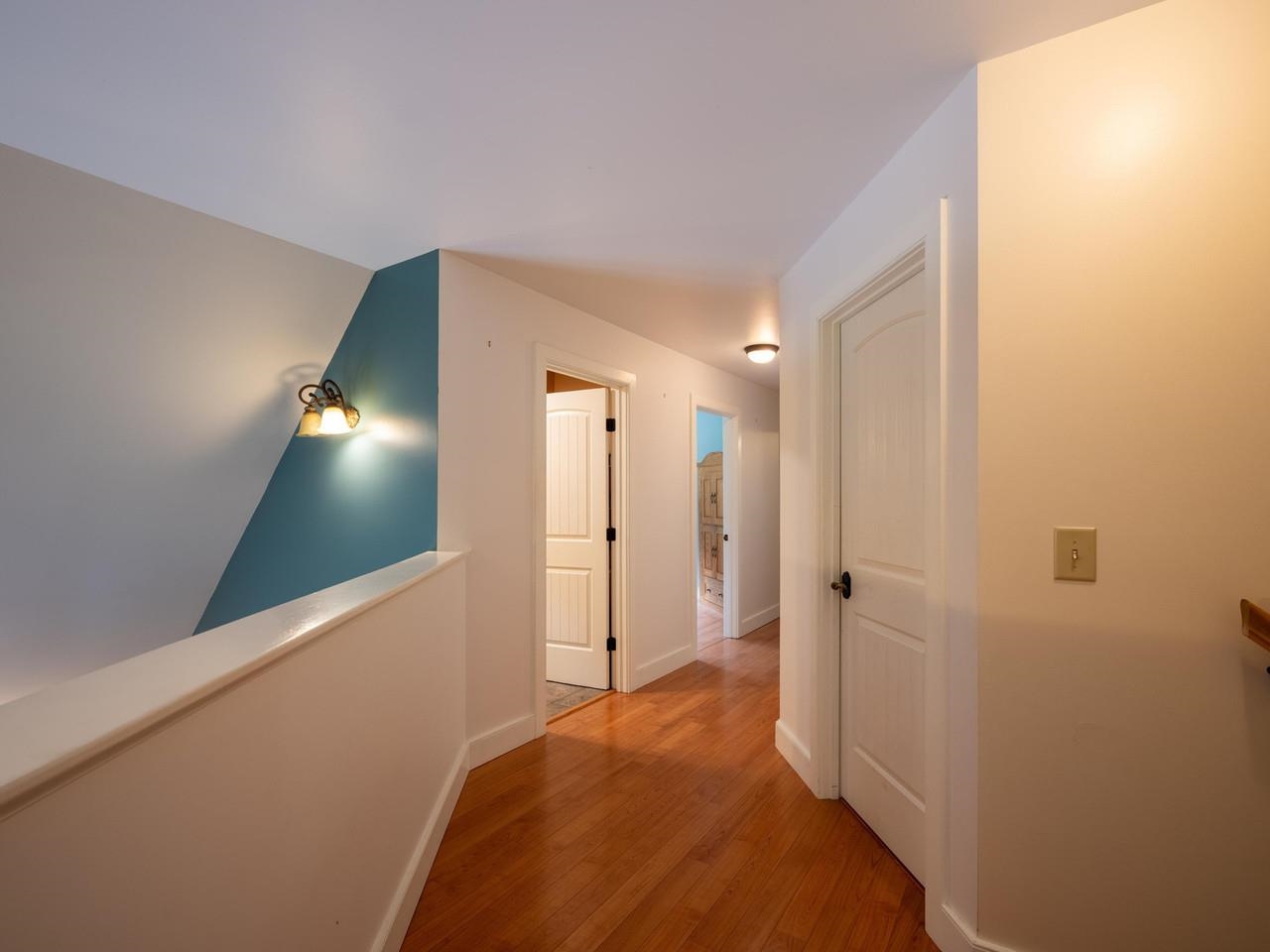 Hallway to more bedrooms