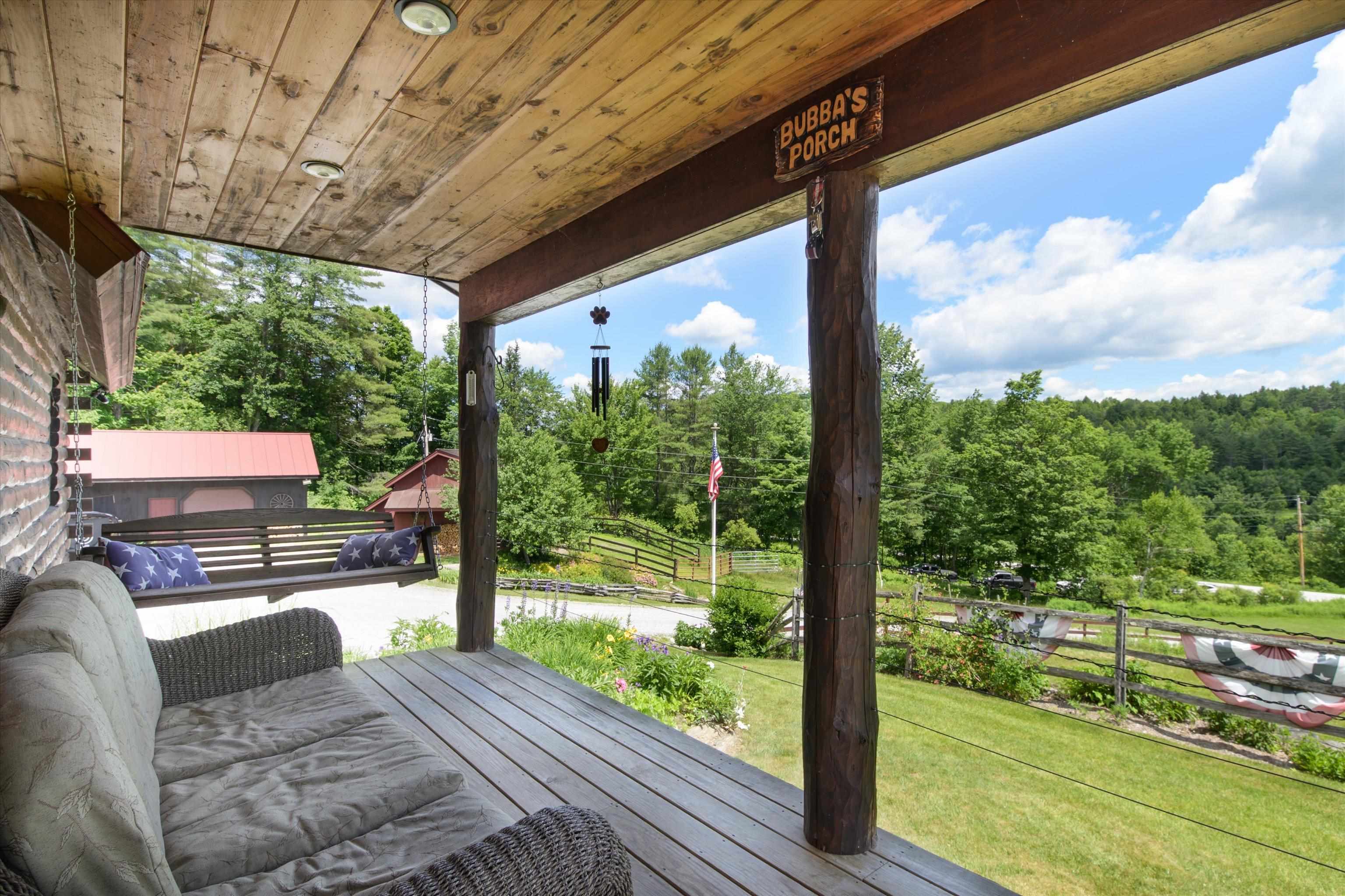 Relax on the expansive covered front porch...