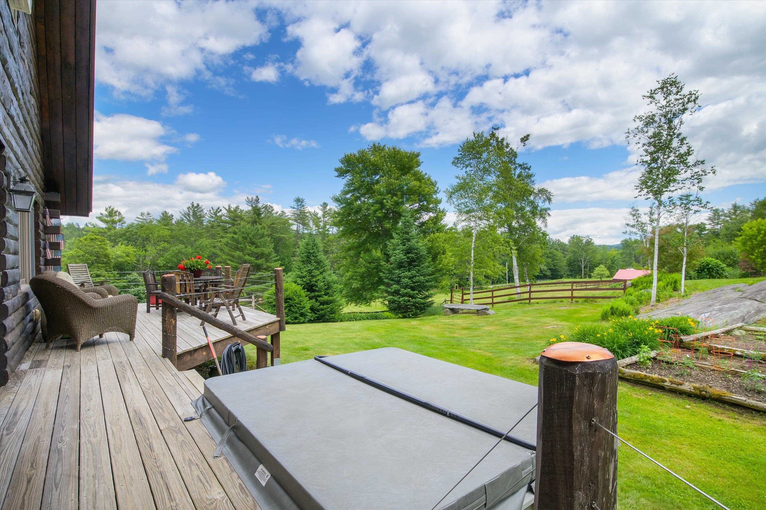 or side porch with hot tub...