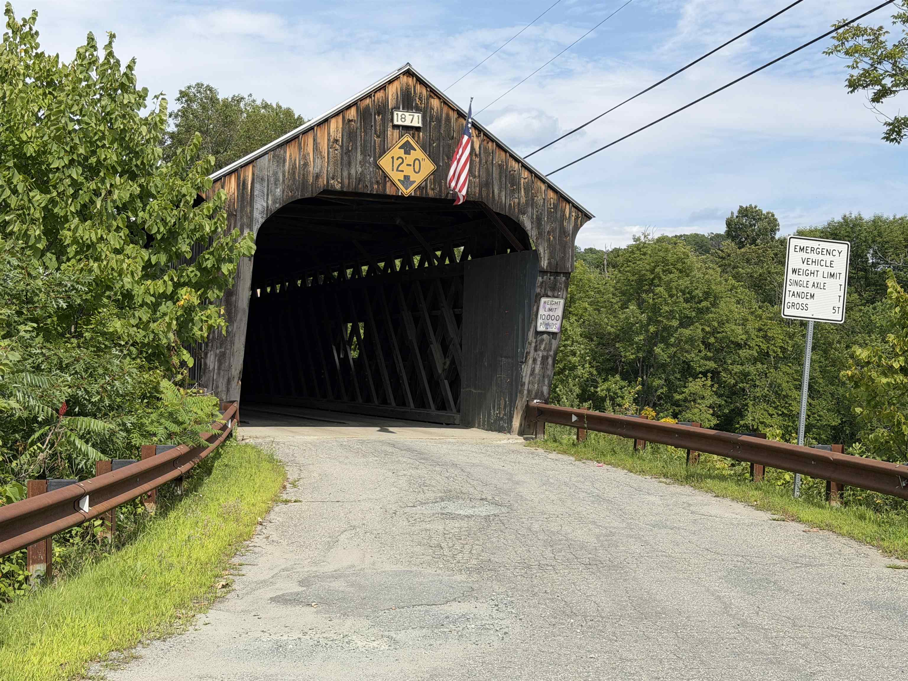 Cross the two covered bridge close to home. 26031002