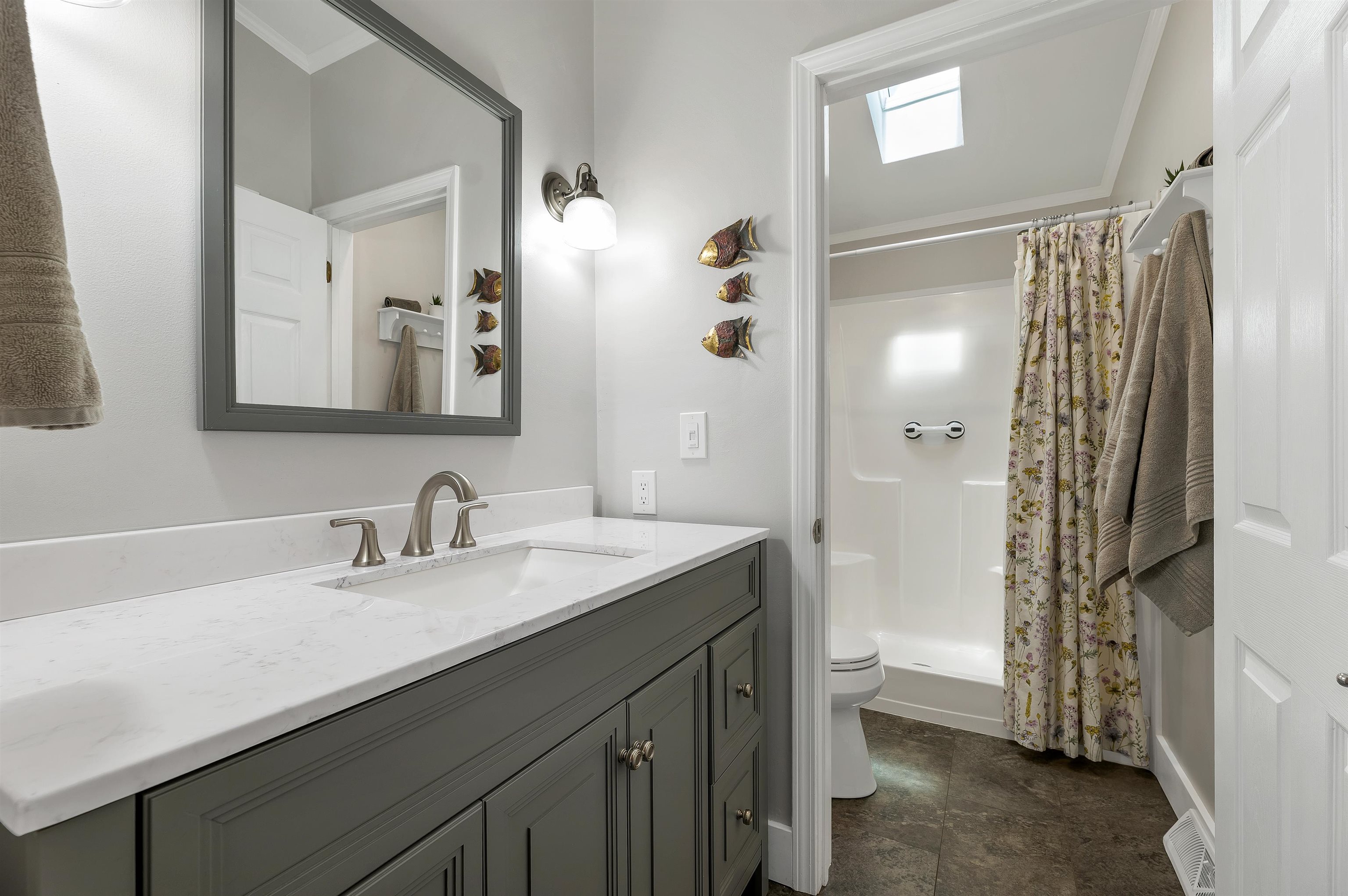 Primary bath w/ walk in shower.