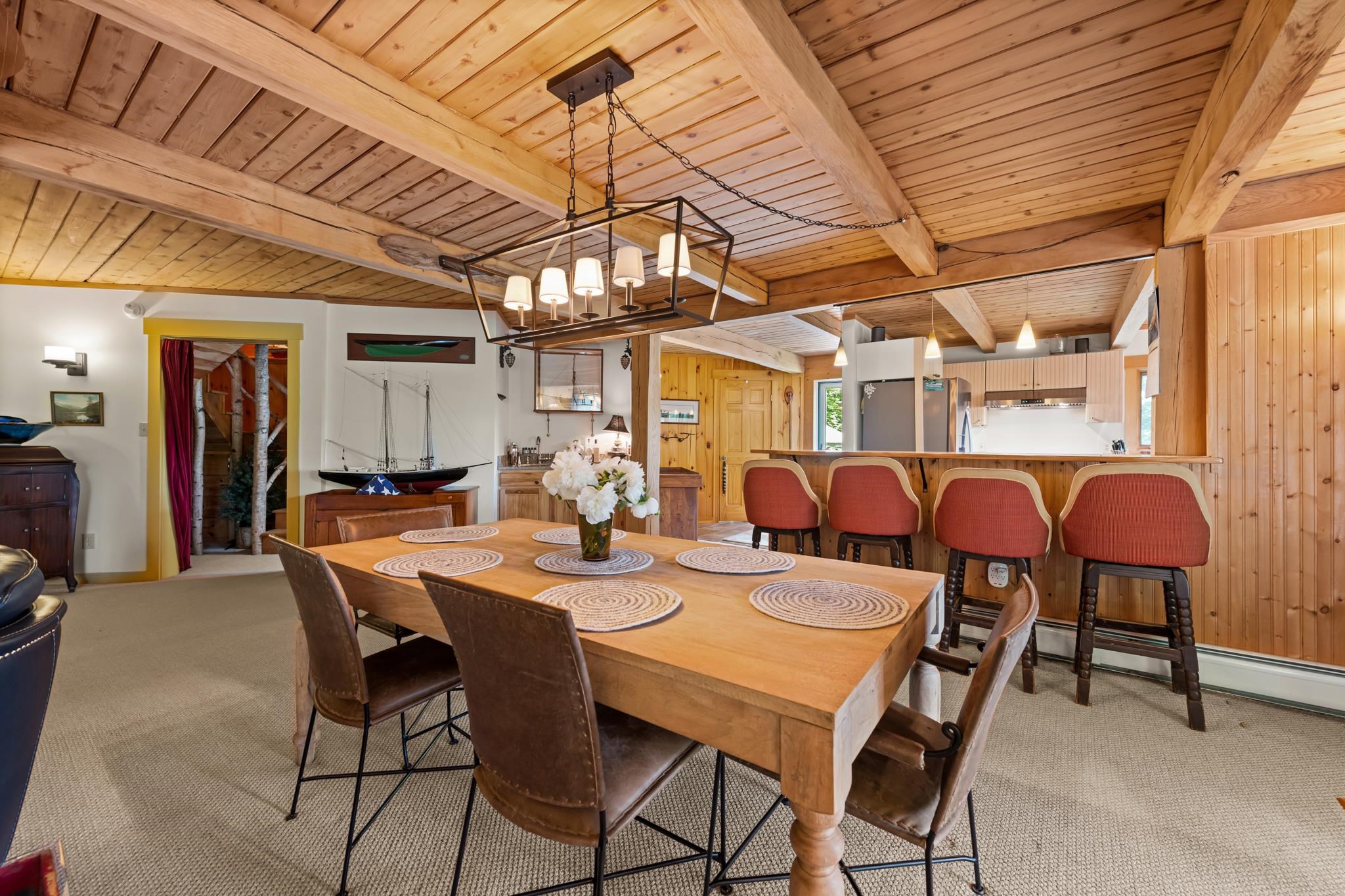 The wood ceilings give the dining/living room a cozy feel!