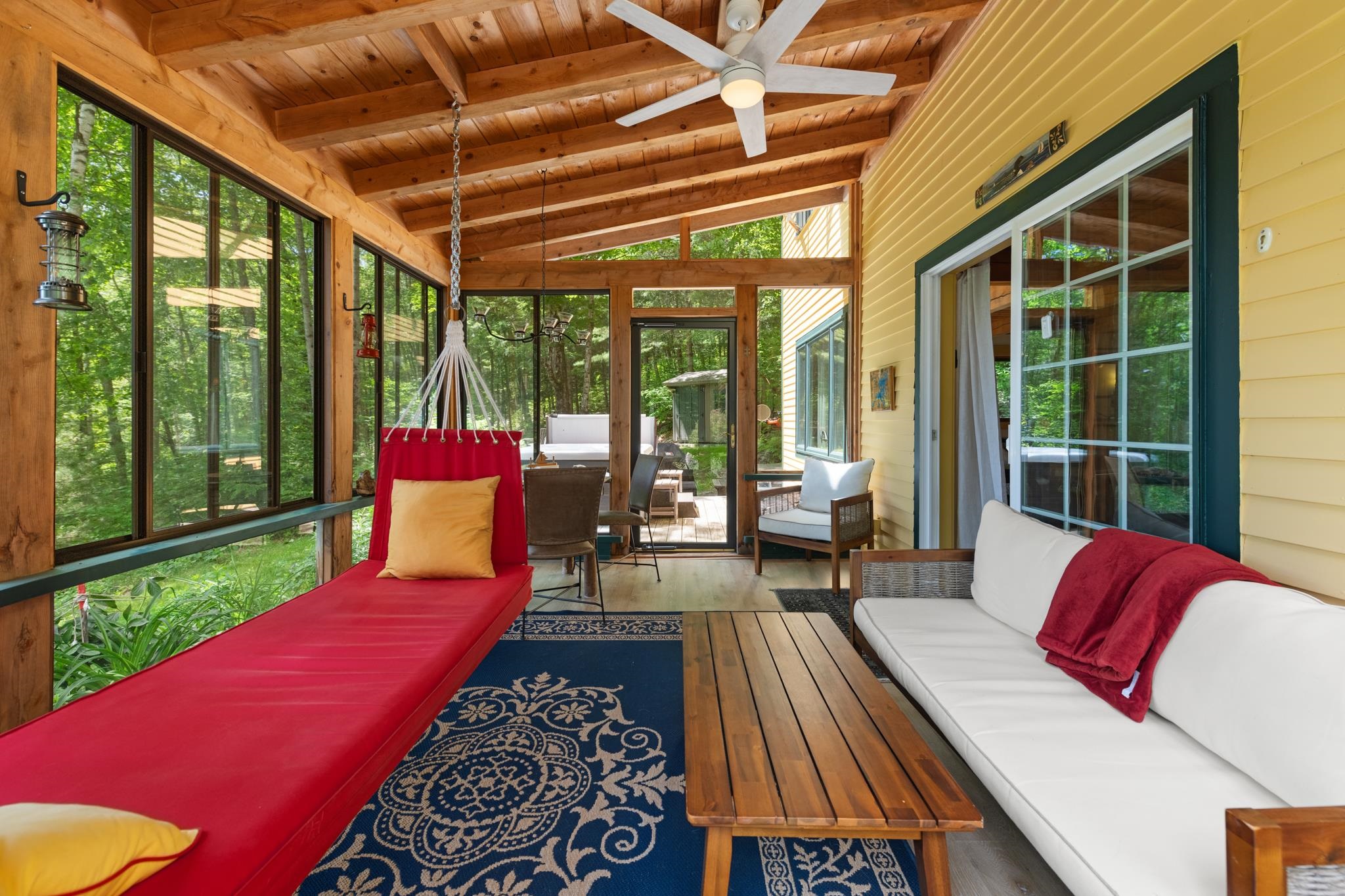 The wood ceilings continue to this great porch!