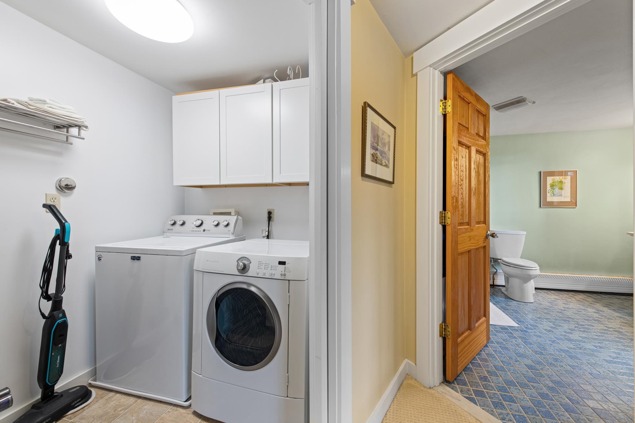 The laundry room right off the bathroom
