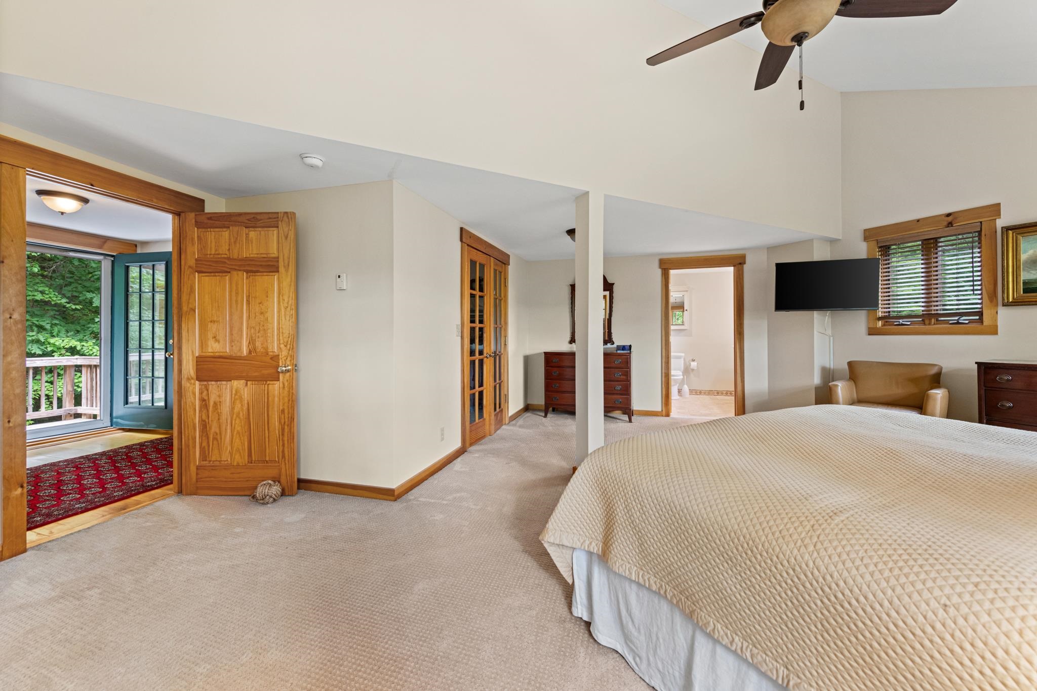 Welcome to your spacious primary suite with vaulted ceilings, a walk in closet and large bath
