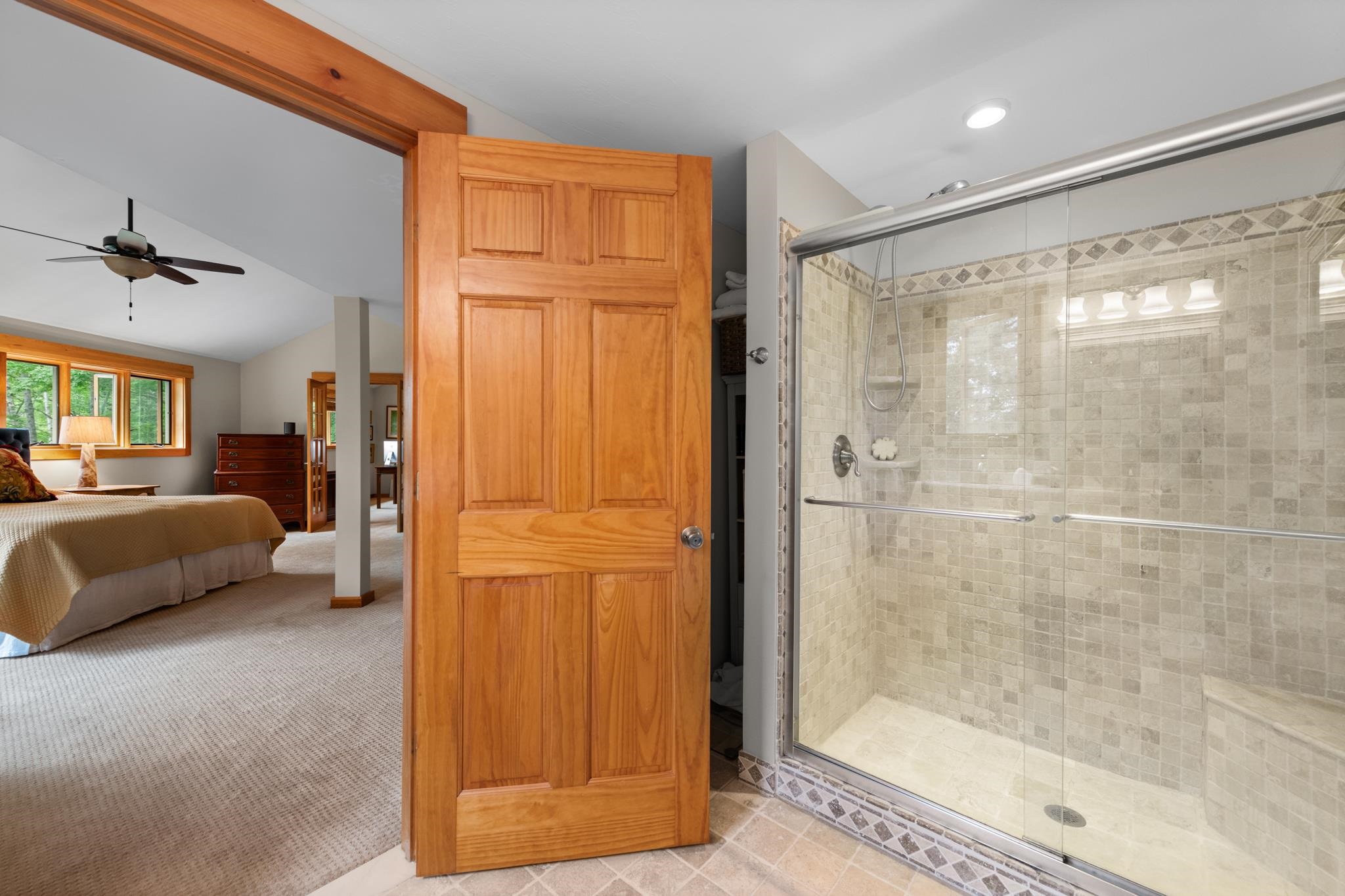 Custom tiled shower with a built in bench