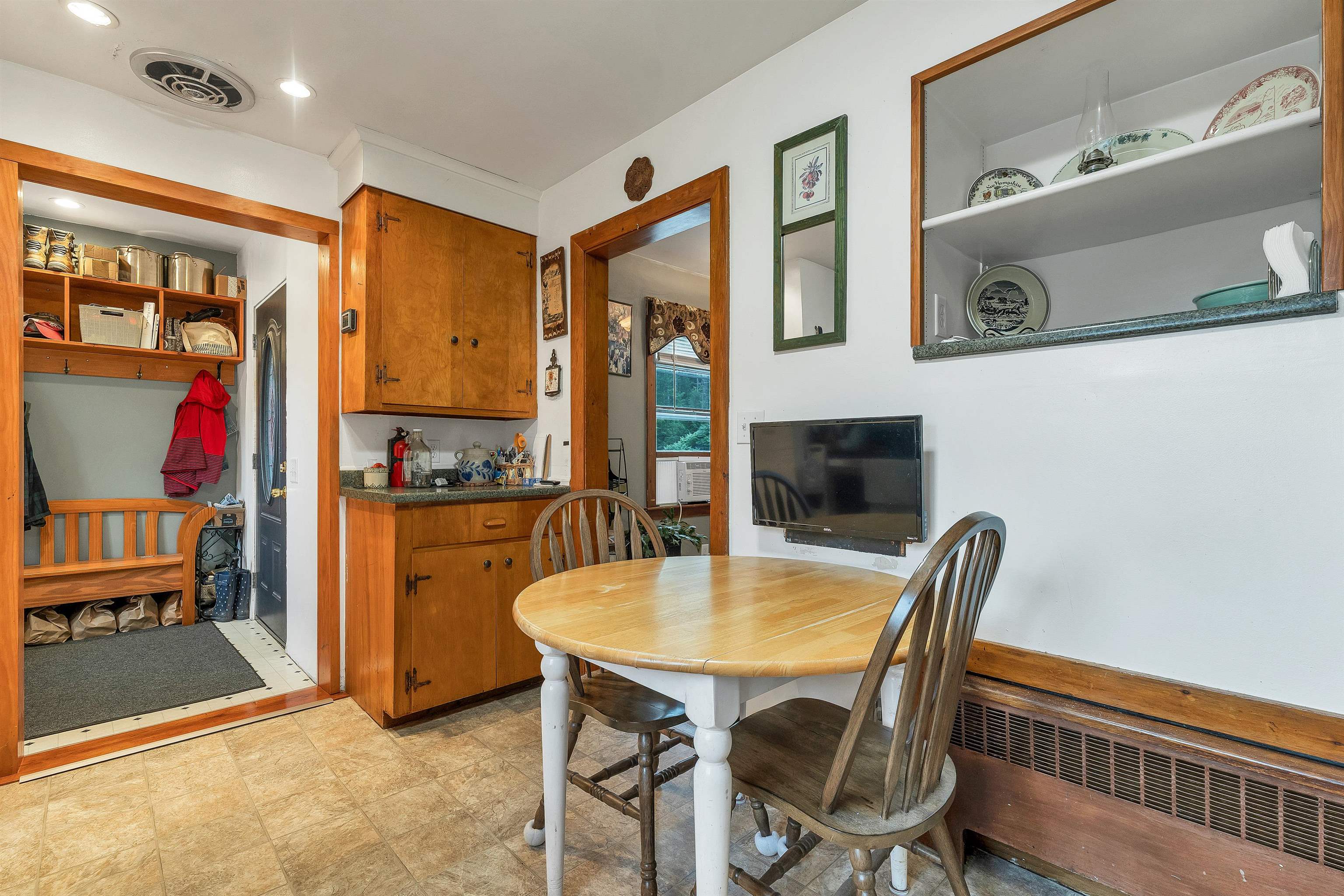 Looking from the kitchen to the entry