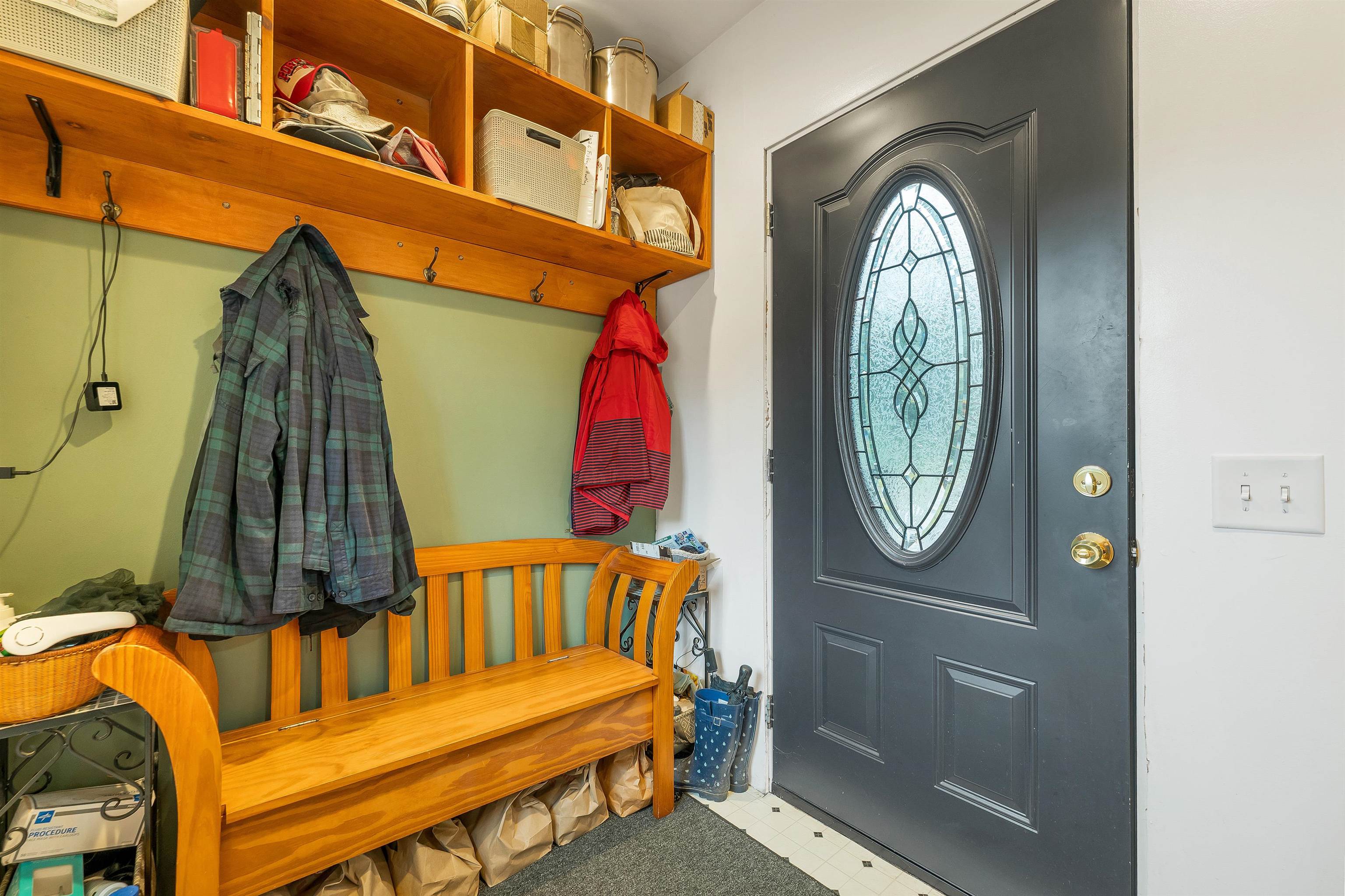 Enter the home through a newer mudroom/entryway