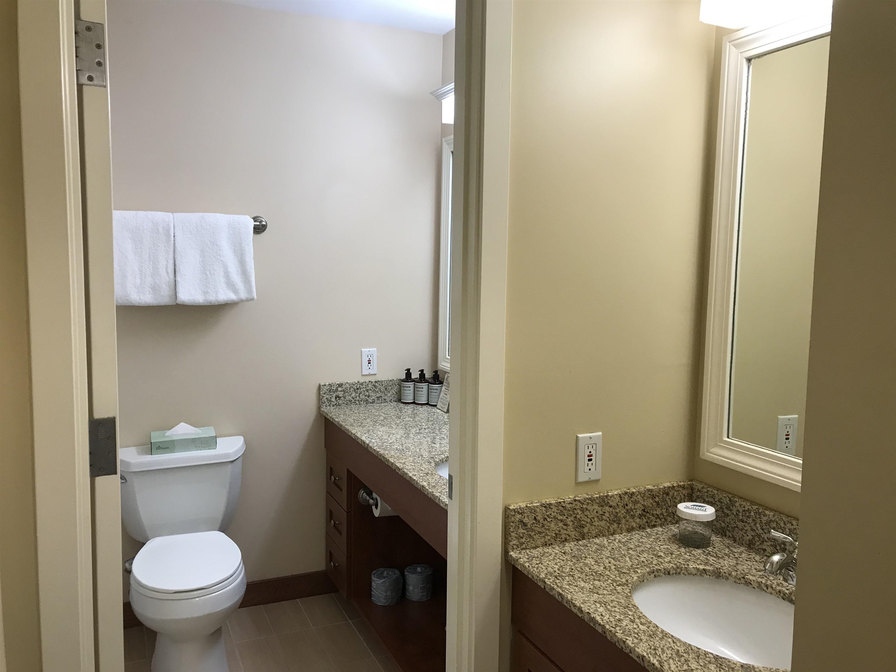Full bathroom with additional outer sink