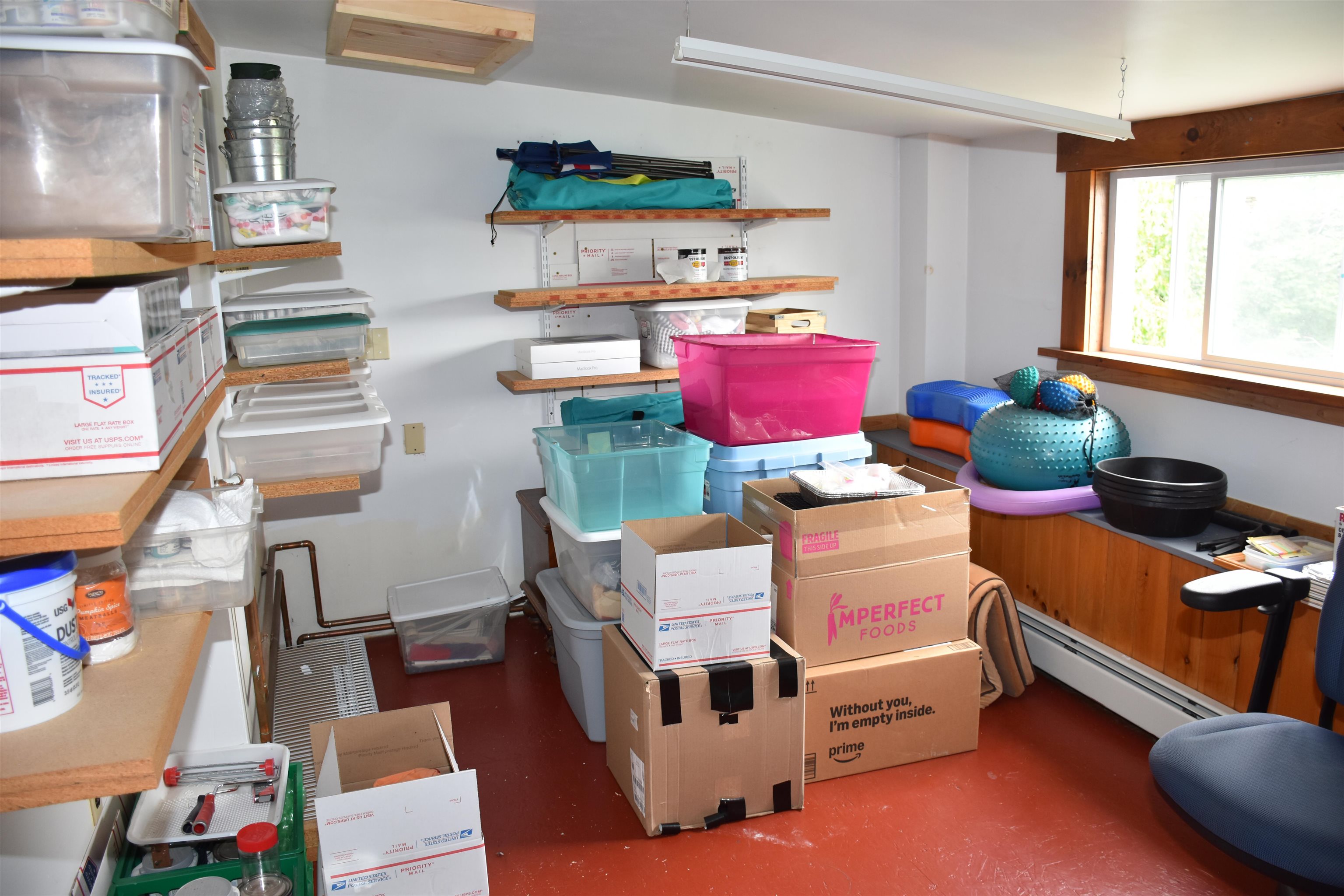 Either a walk-in closet or separate storage room