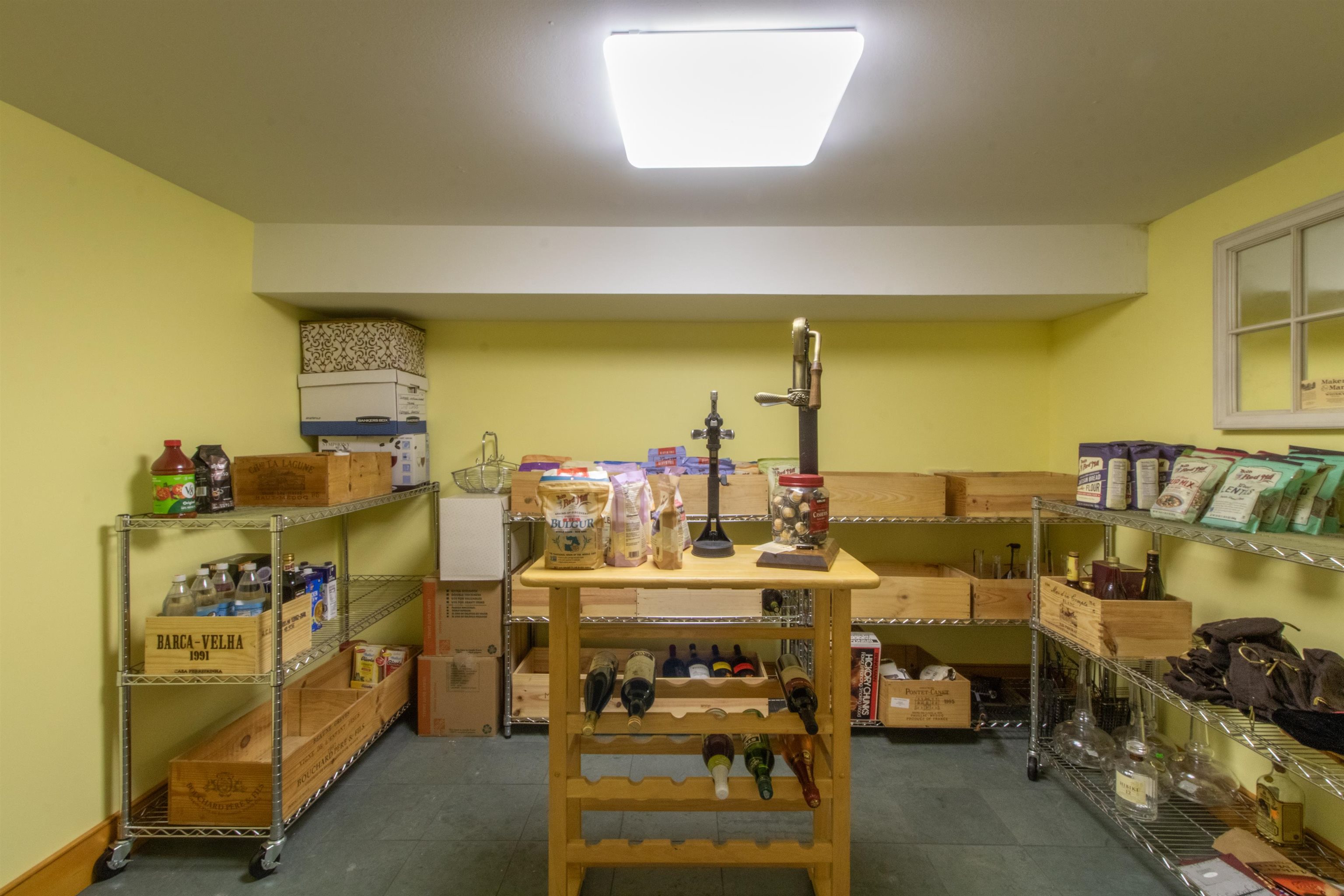 Refrigerated wine cellar of the lower level kitchen