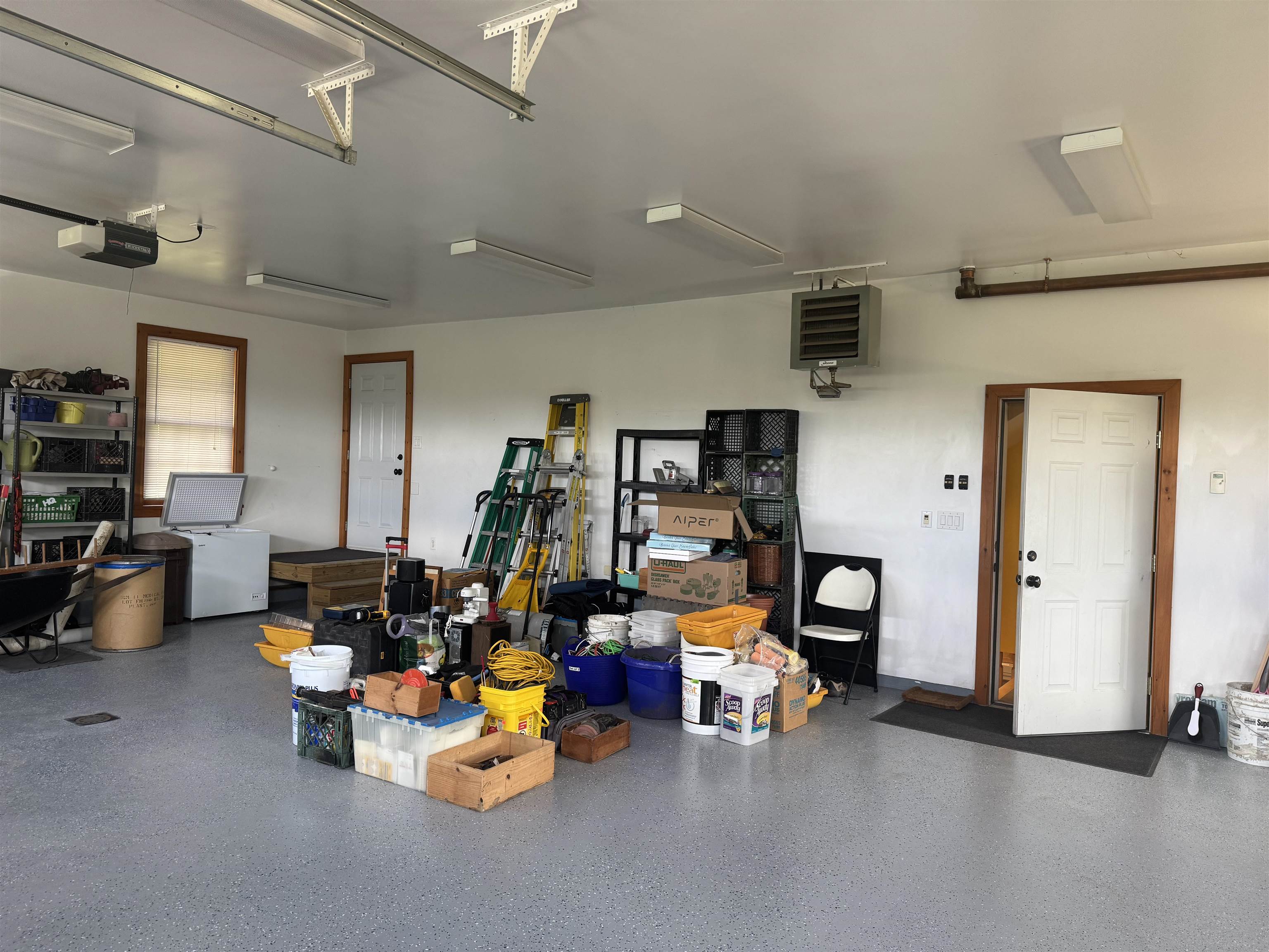 The garage with entrance to the mudroom