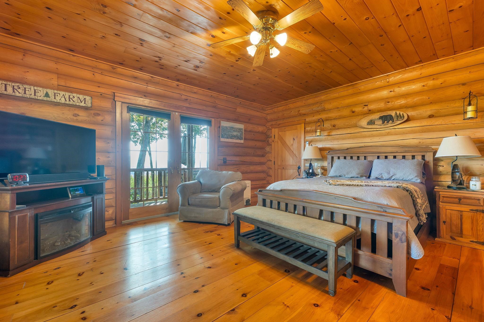Primary Bedroom with Large Door to Deck and Views