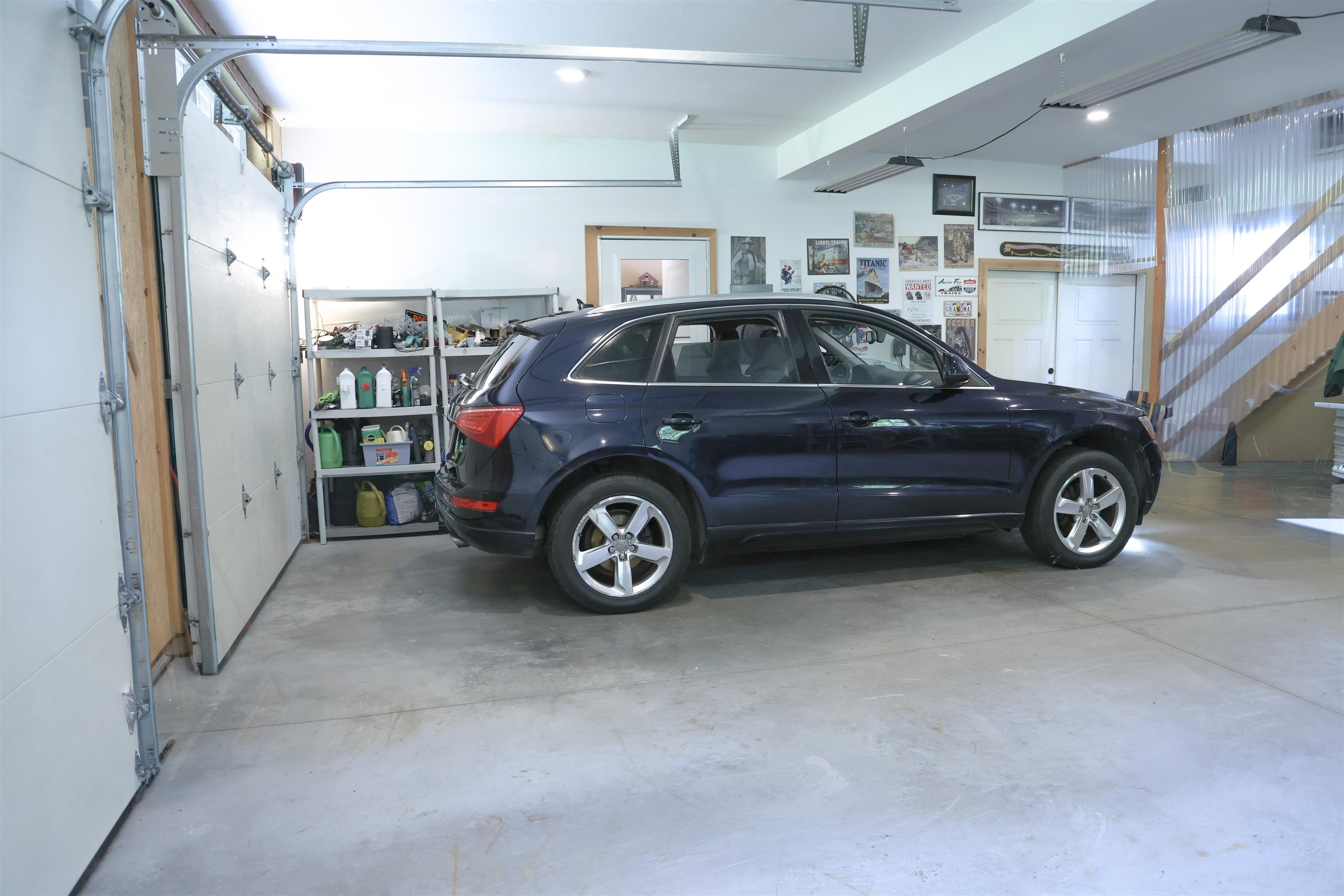 2 car garage with power doors. Has a second floor