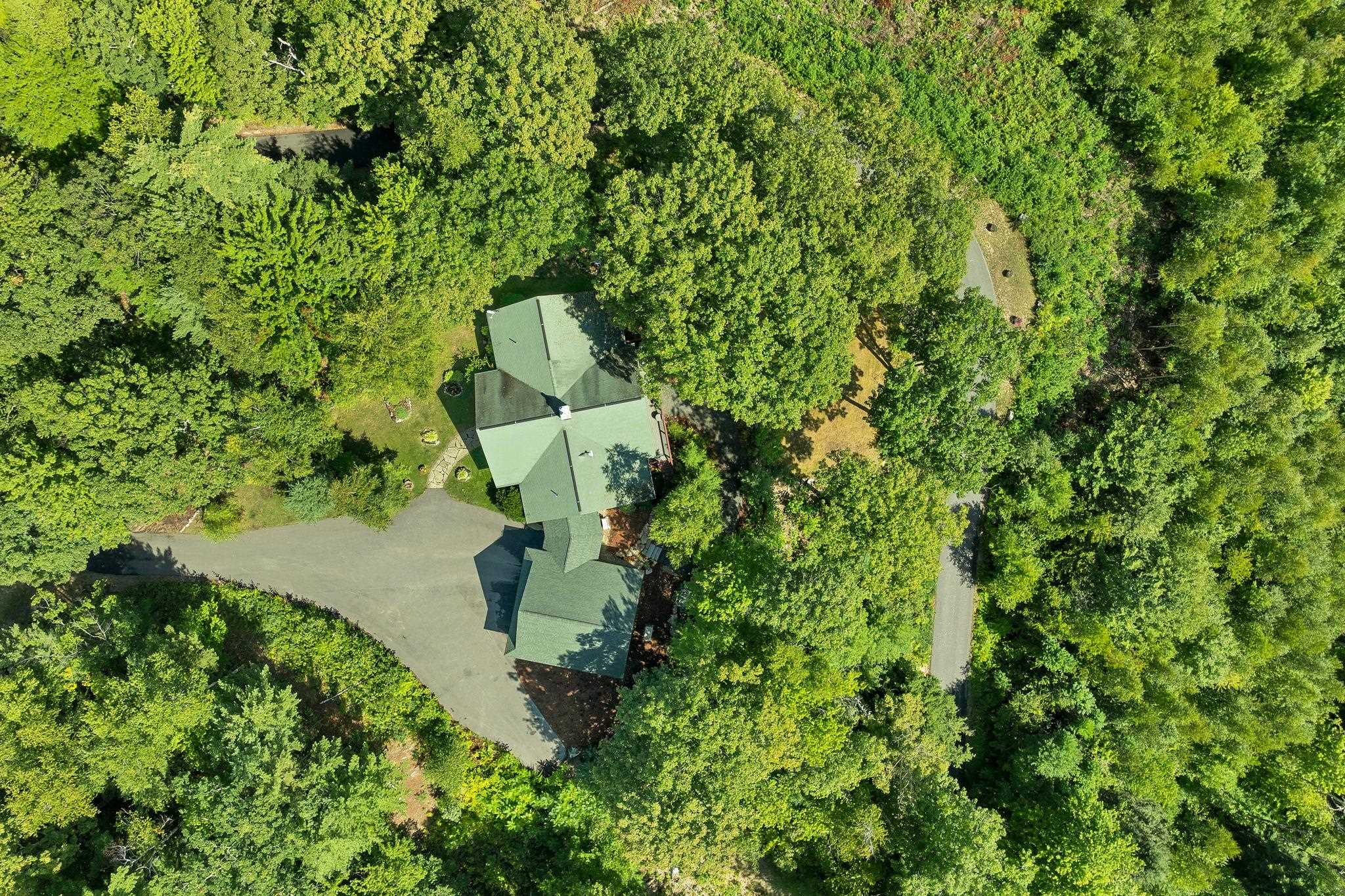 17 acre wooded lot with level area for garden