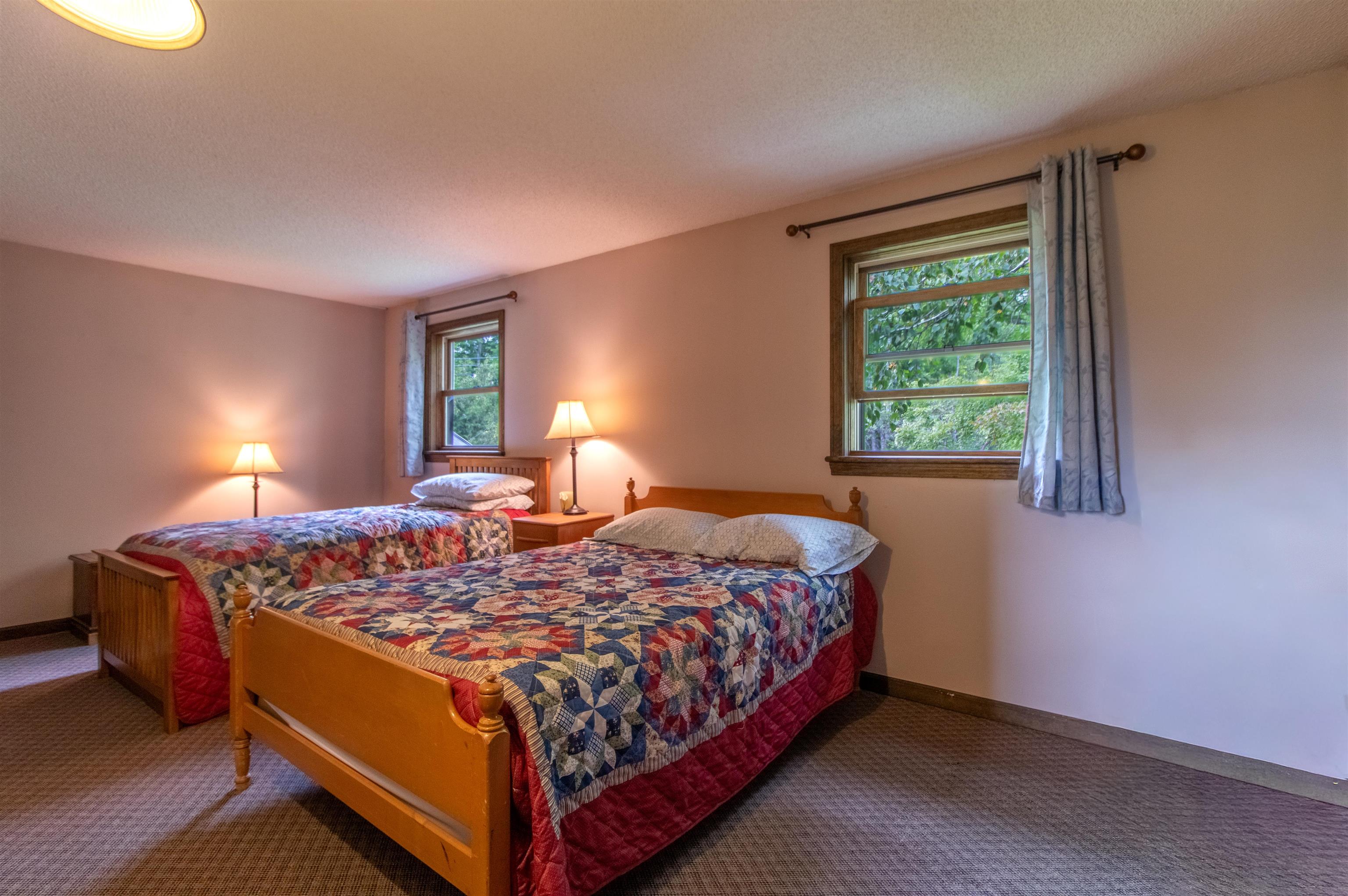 Bedroom at the top left of the stairs