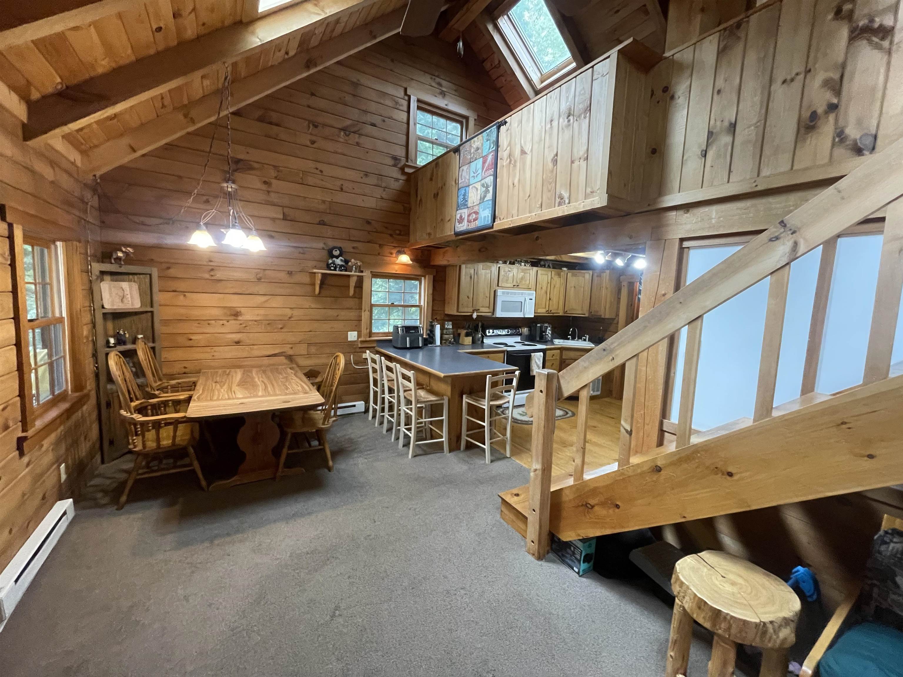 living room, dining and kitchen