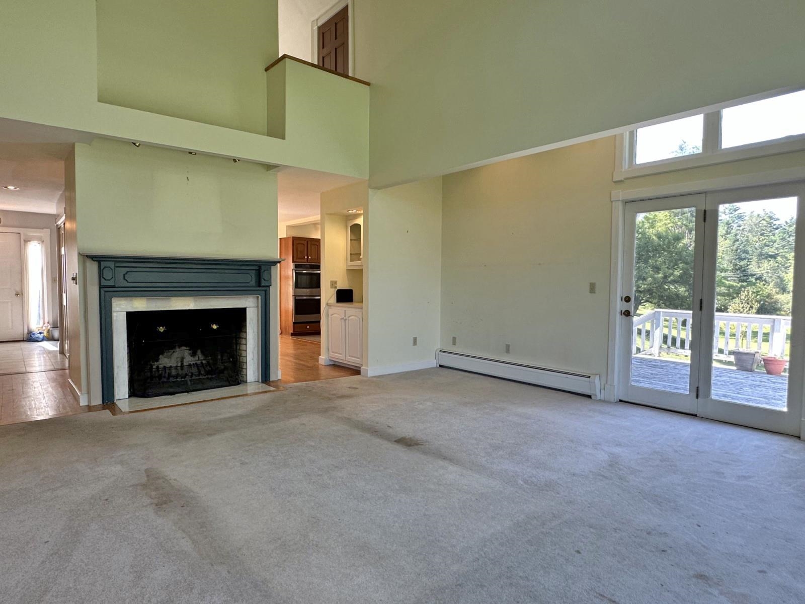 Looking from Living Room Towards Kitchen with Bar Area In Between