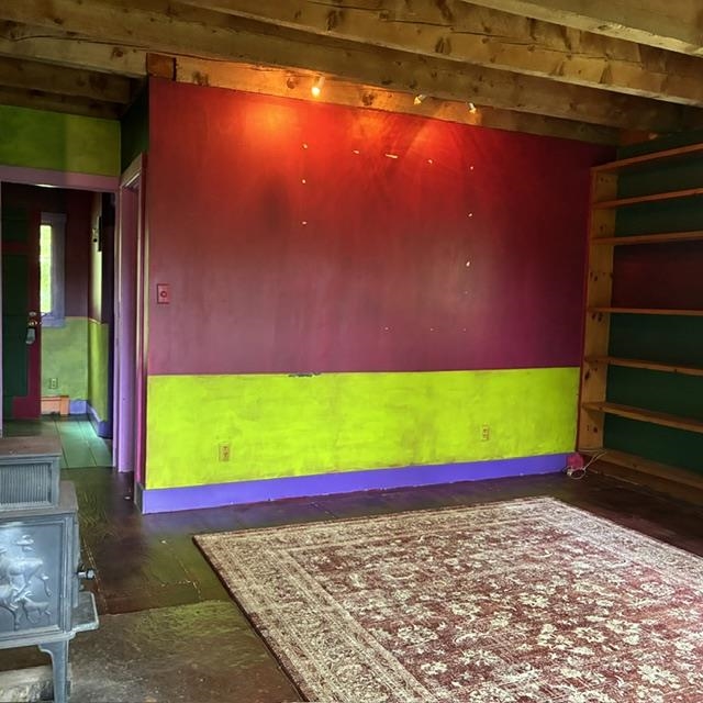 Living room and hallway to the entry way