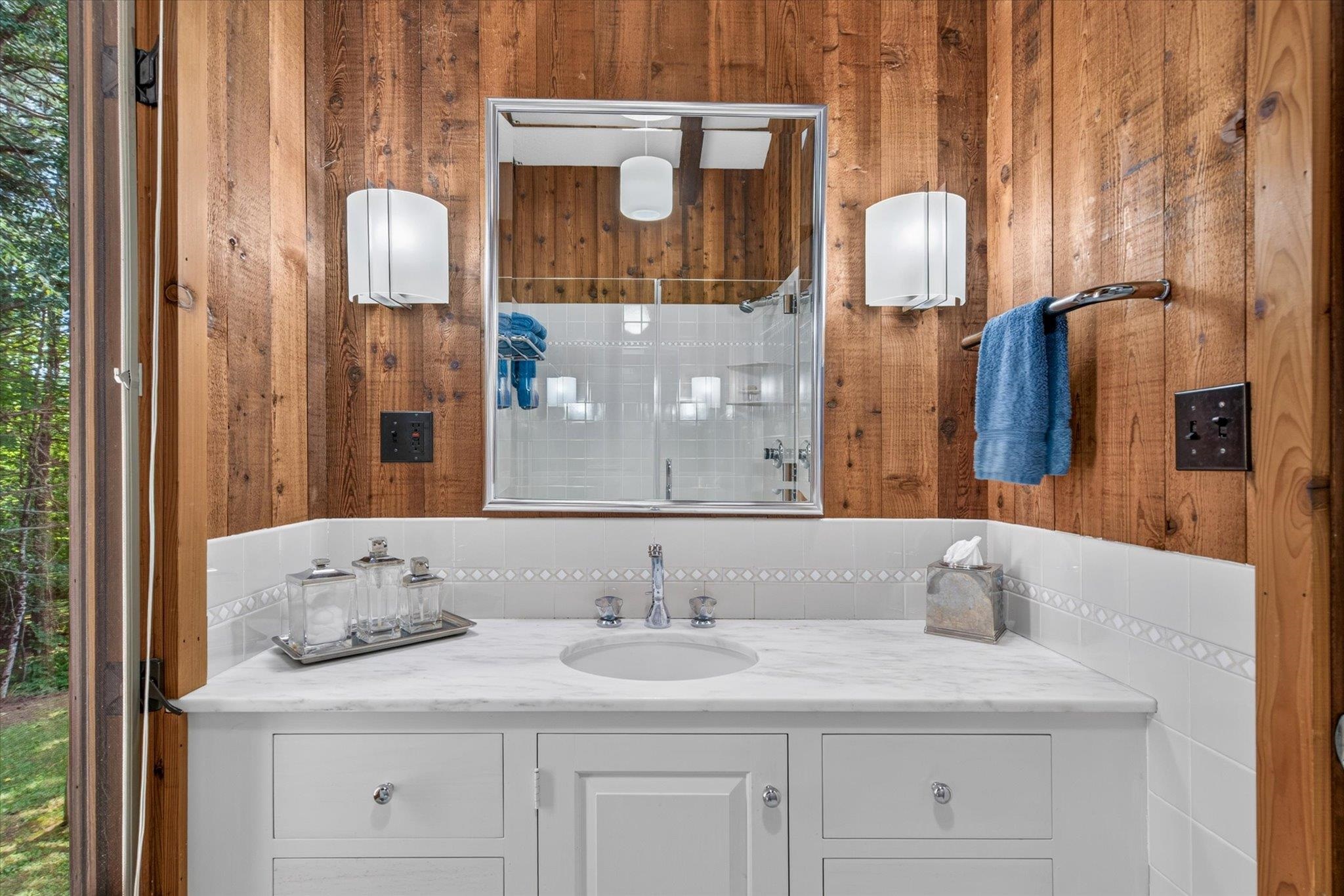 Oversized shower in this bath next to the second main floor bedroom