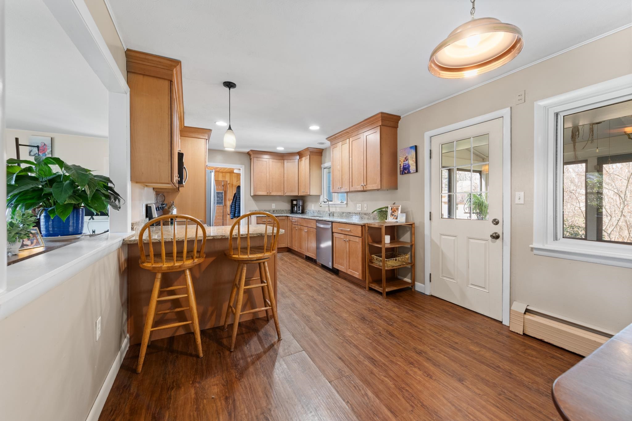 The kitchen leading into the dining room