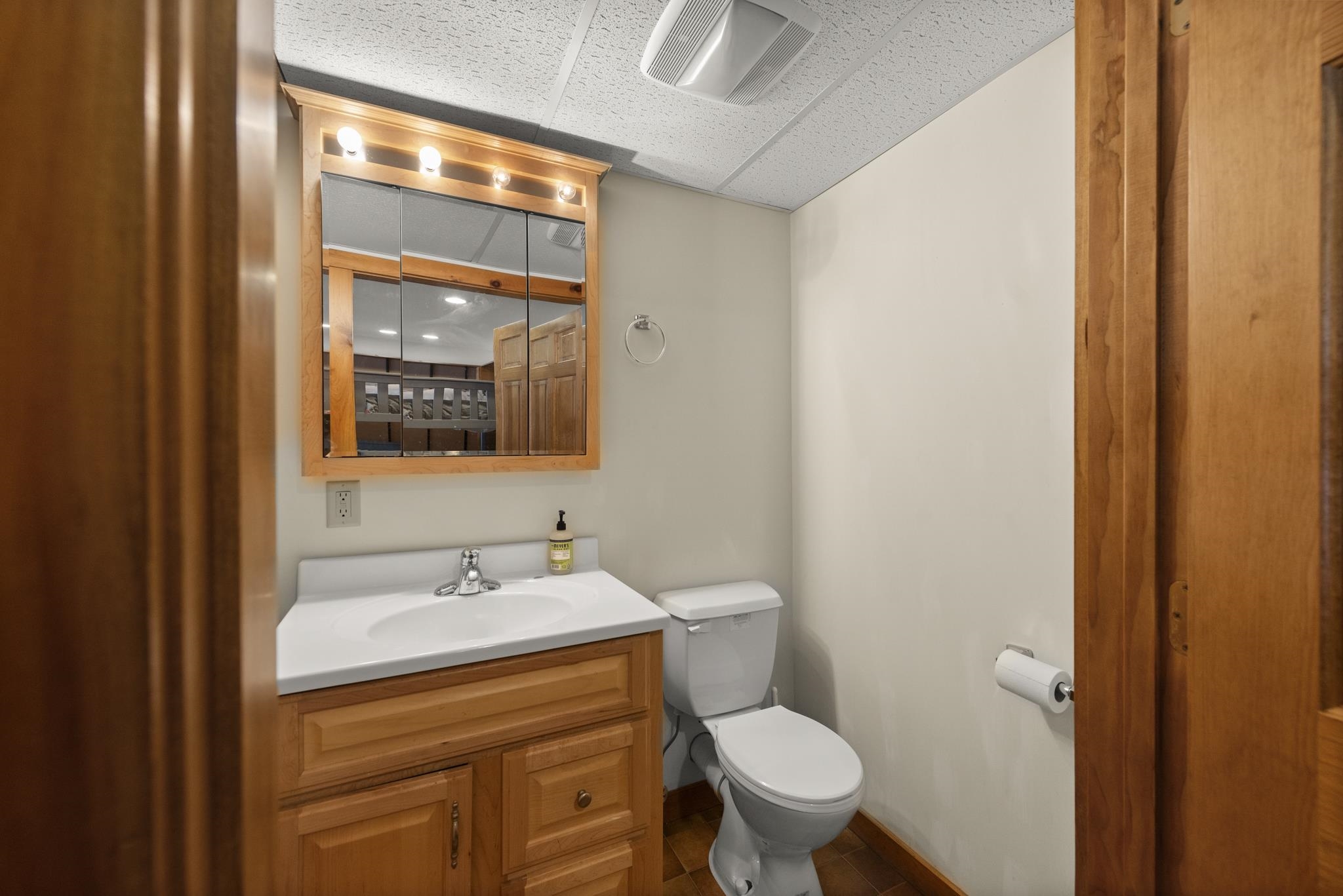 1/2 bathroom located on the lower level