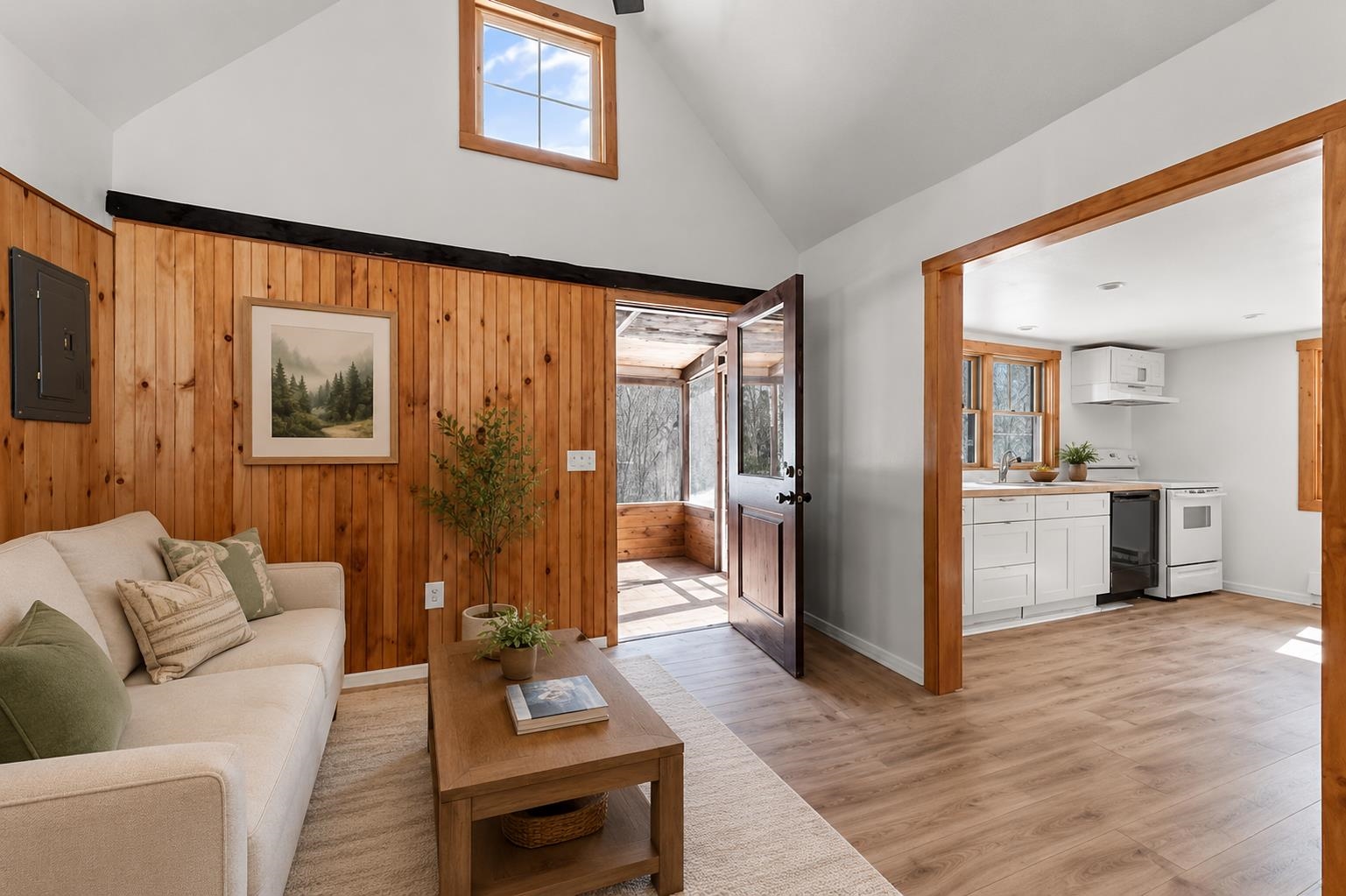 You enter into the living room with a loft above