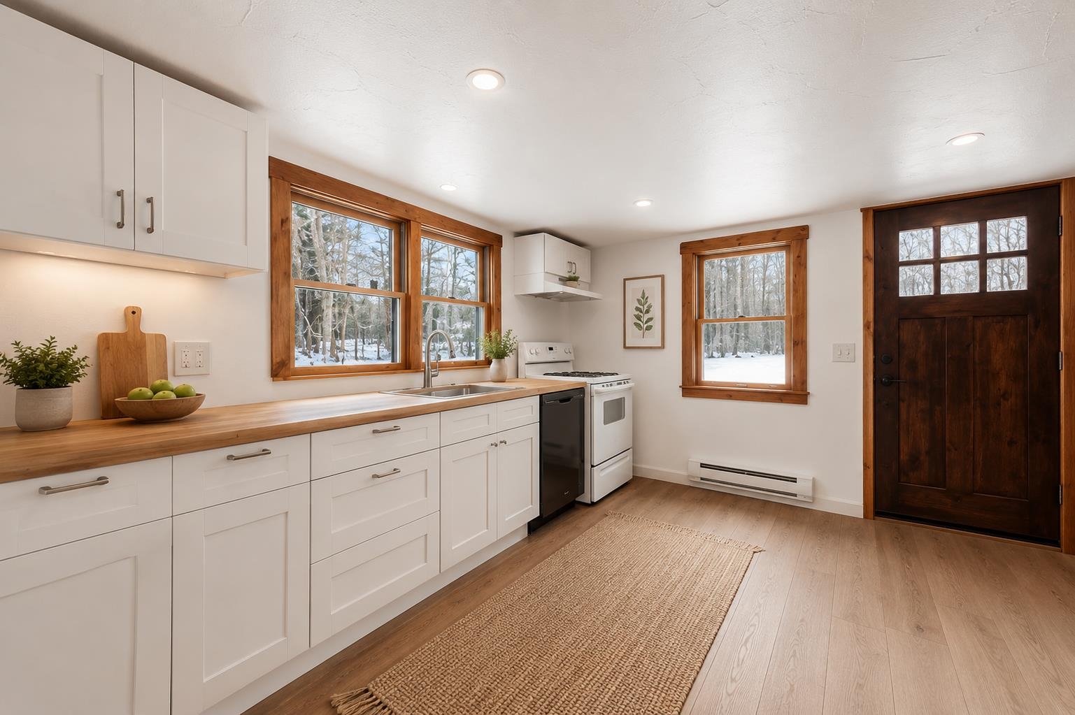 This brand new kitchen featuring butcher block countertops!