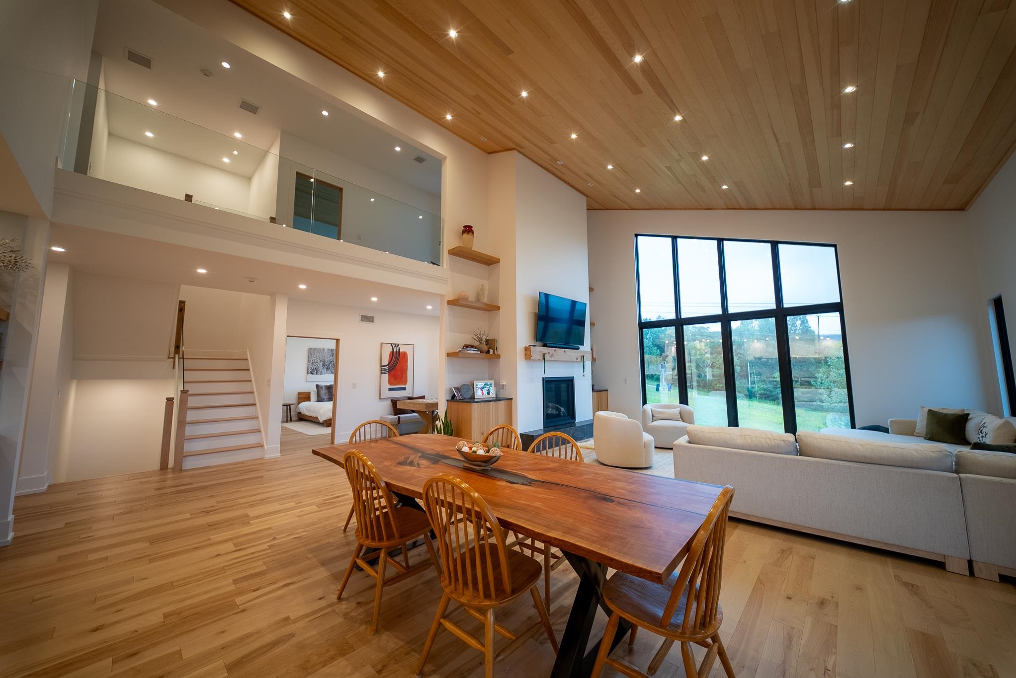 Dining, Great Room and View into Second Floor