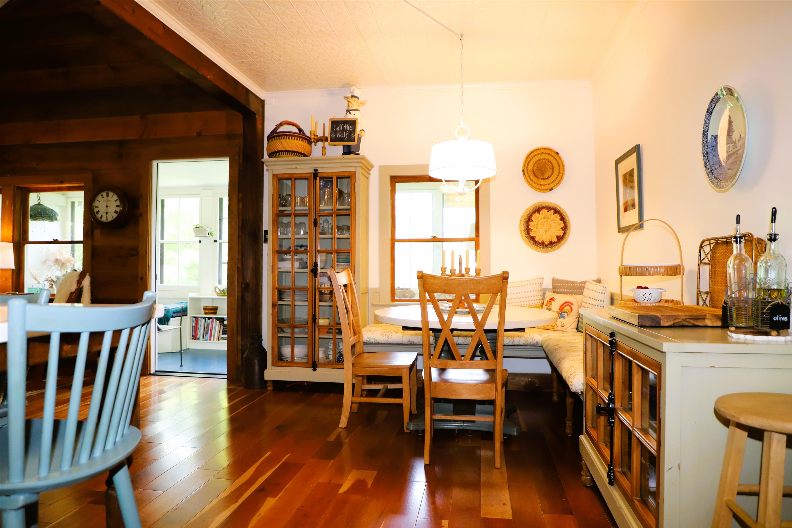 Cherry floors throughout the main level of original house.
