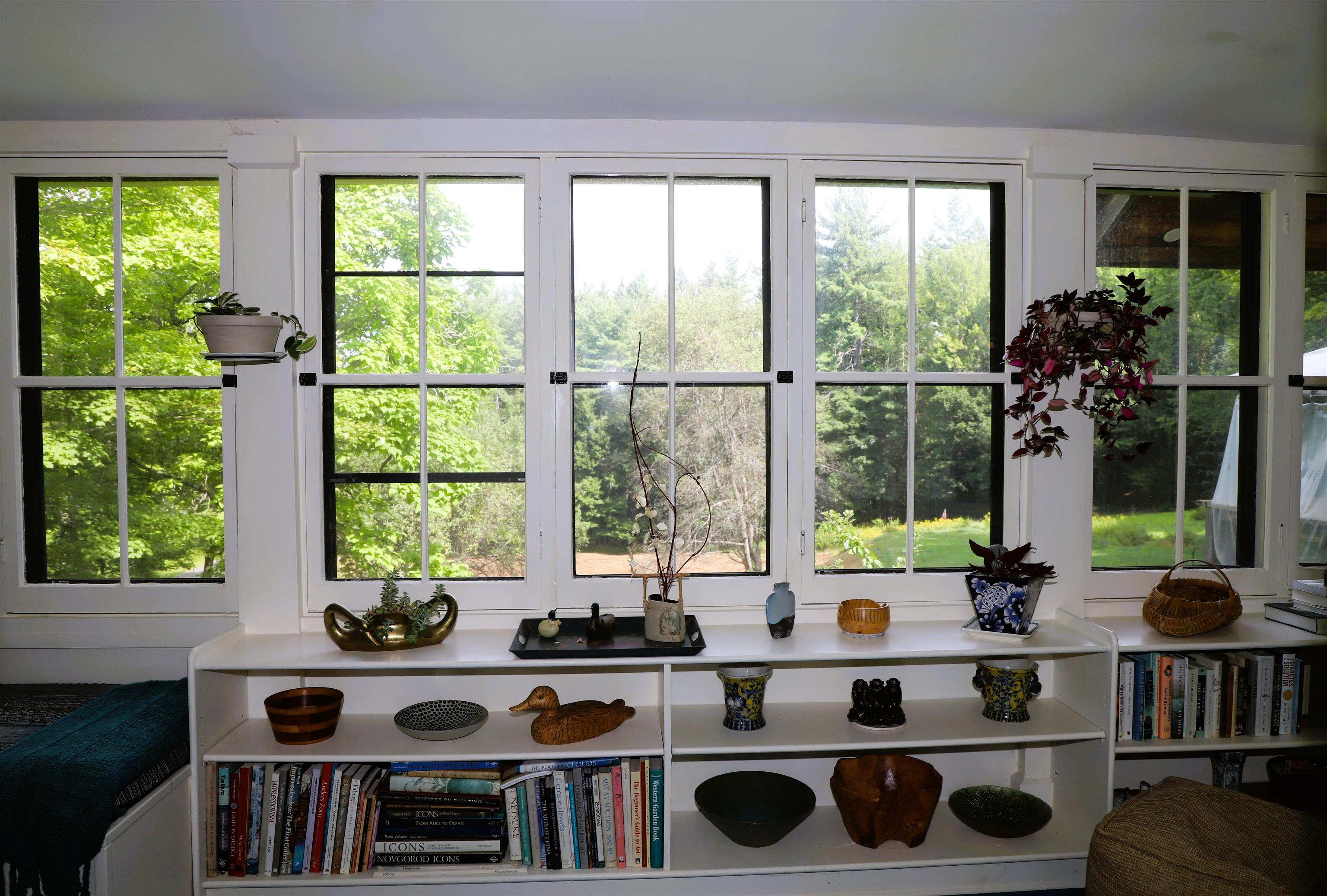 Porch overlooks the side meadow