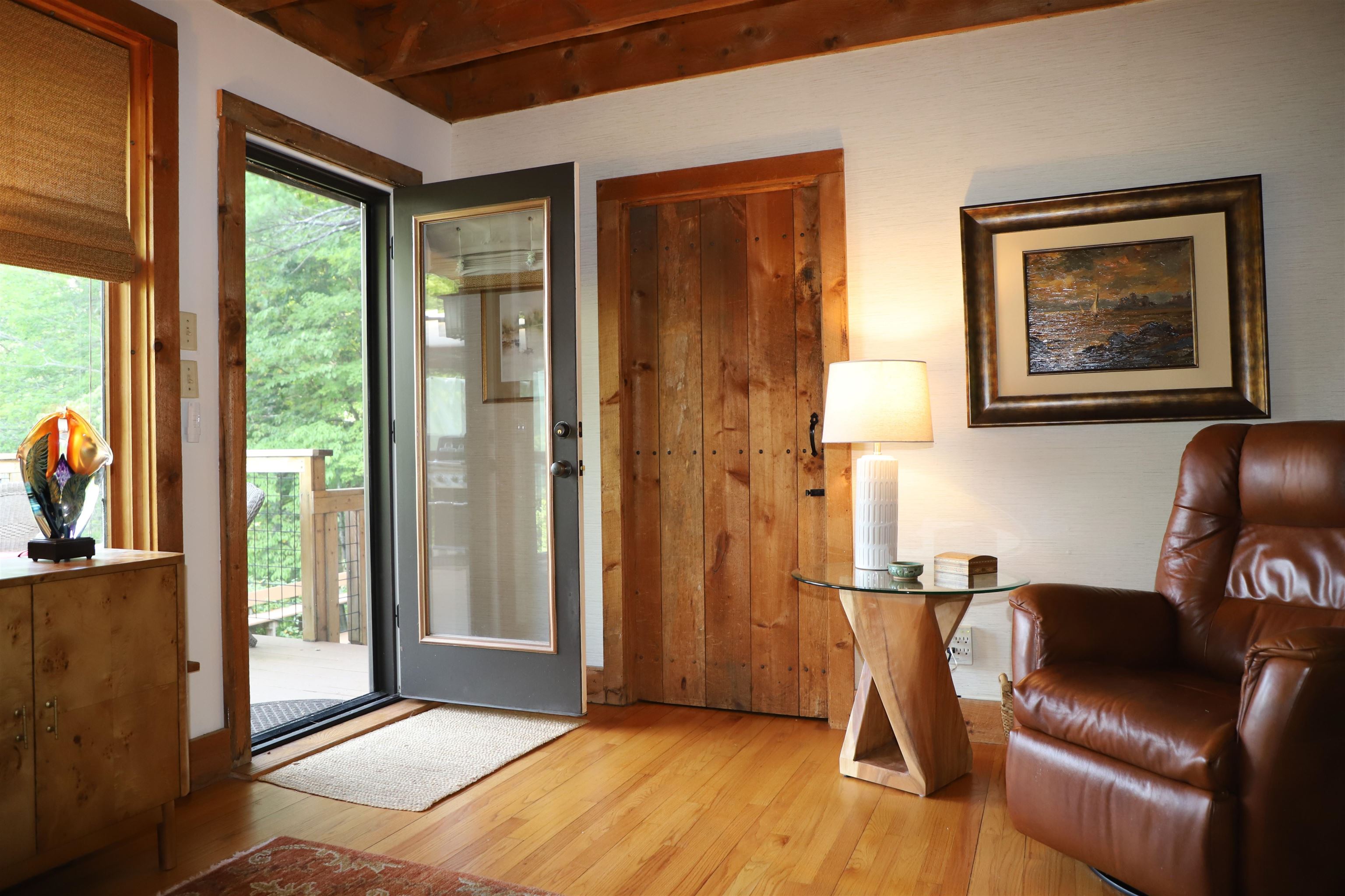 Family room opens to expansive 2 level deck and yard