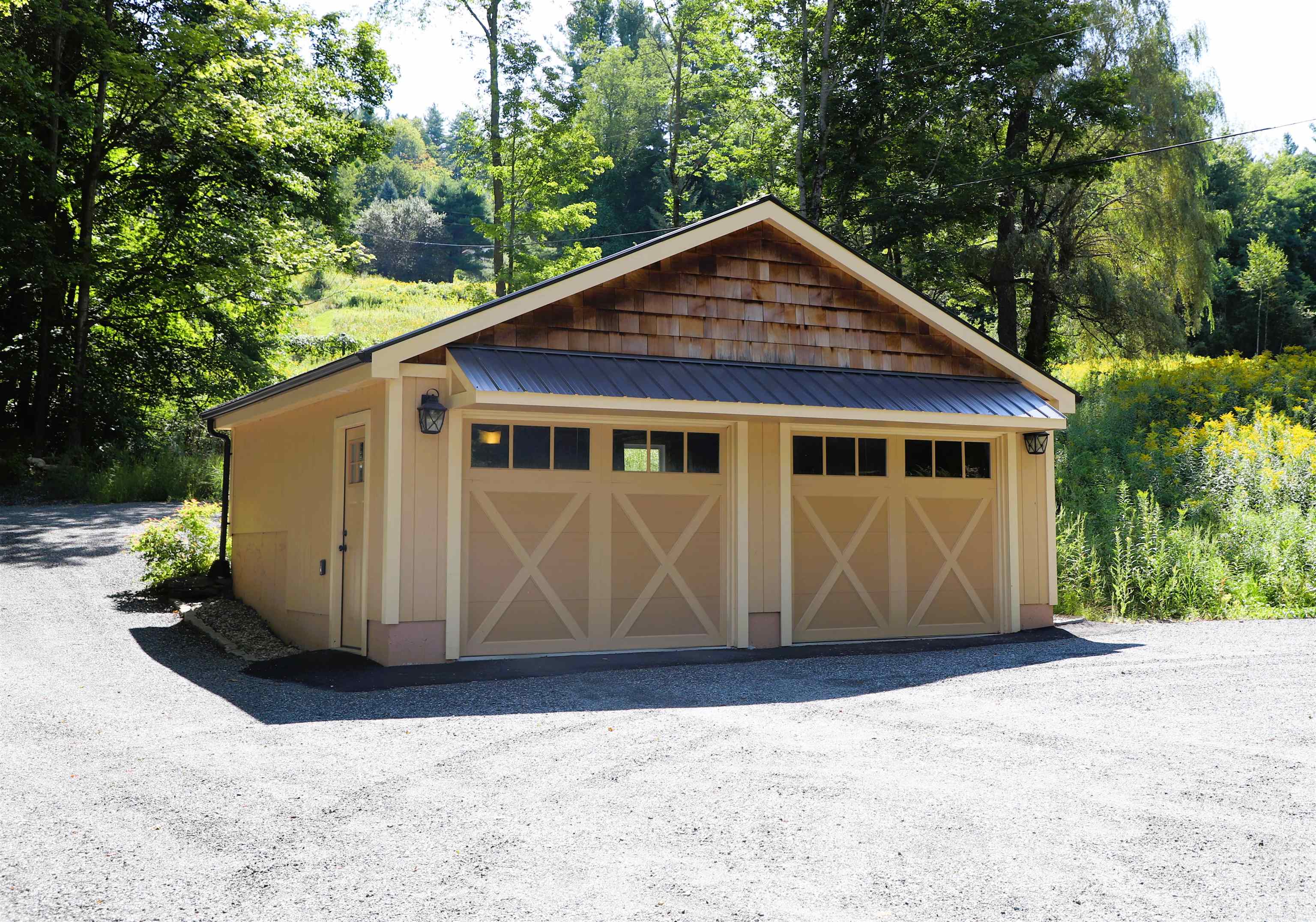Newer 2 car garage to park your cars out of the weather.