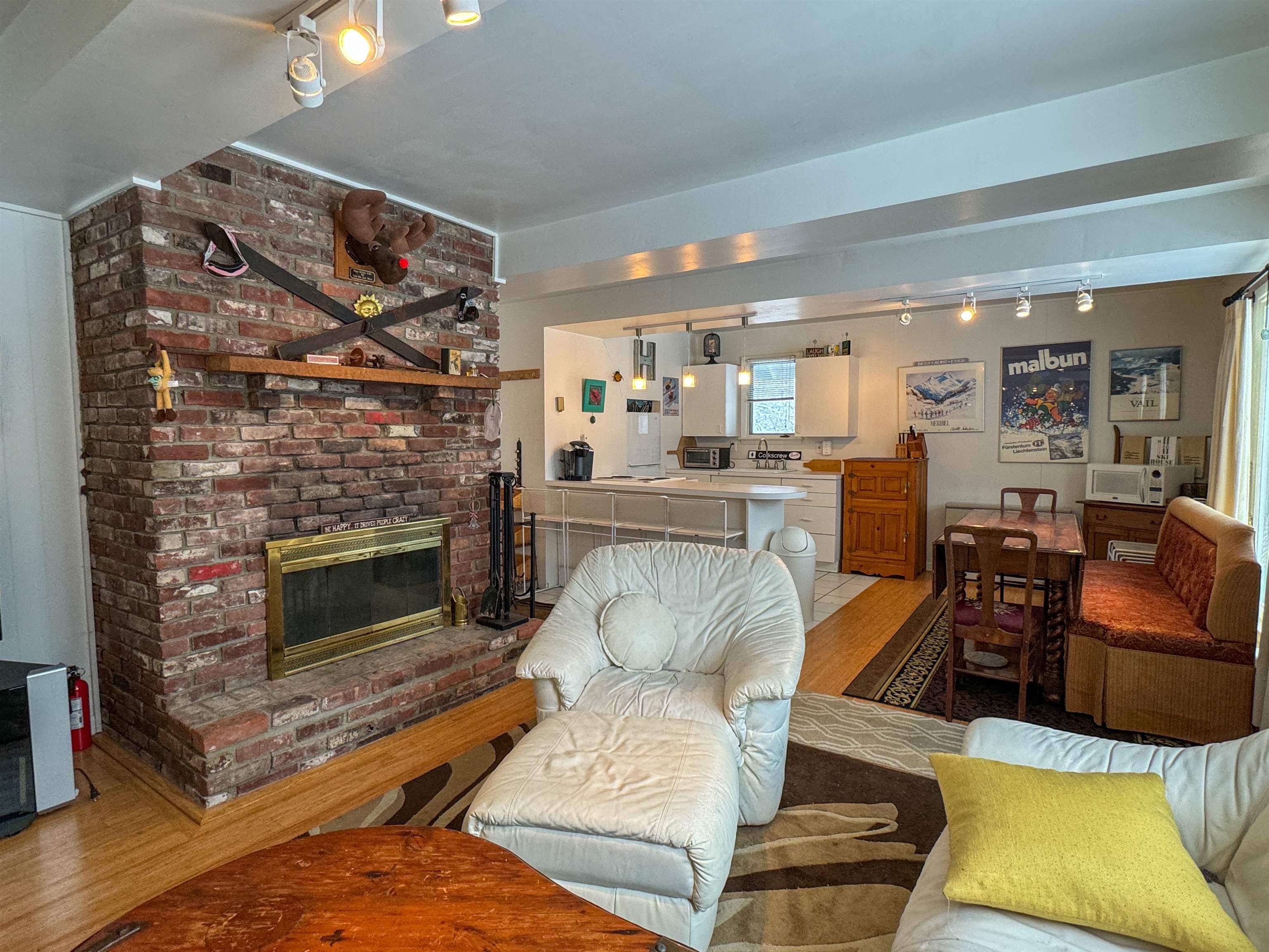 Living room with wood burning fireplace